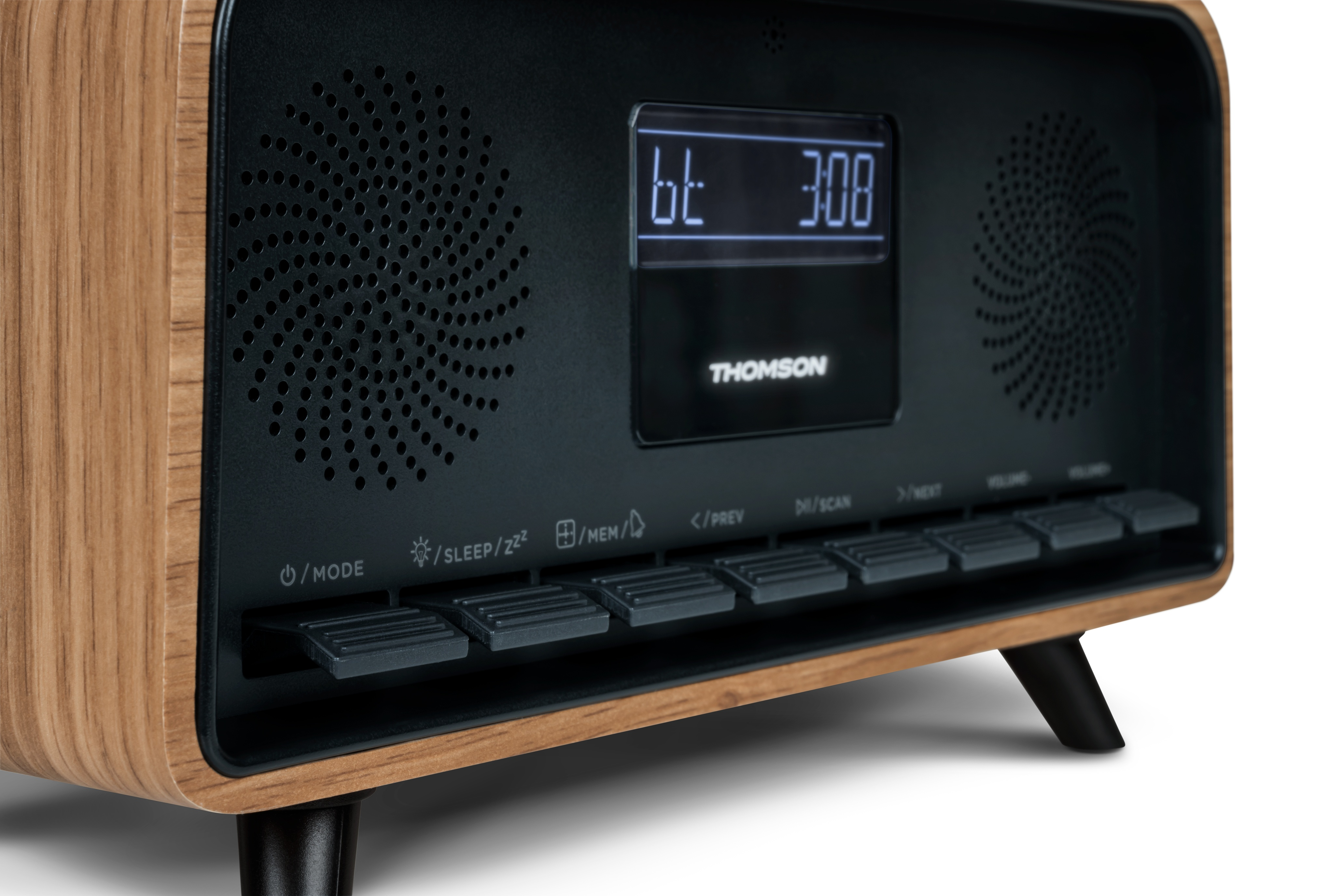 Wooden radio with black front panel, speaker grills, display showing 'bt 3:08', and control buttons.