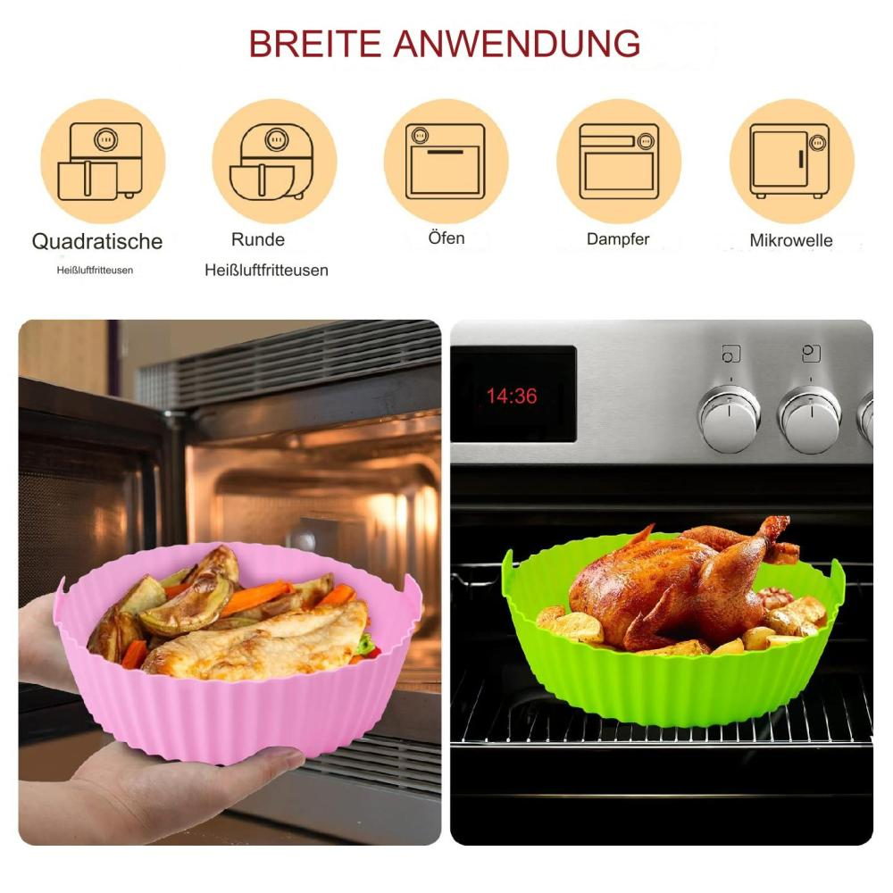 Ein Ofen mit Essen darin. Rosa Silikonbehälter mit Essen links, grün rechts. Zeitanzeige 14:36.