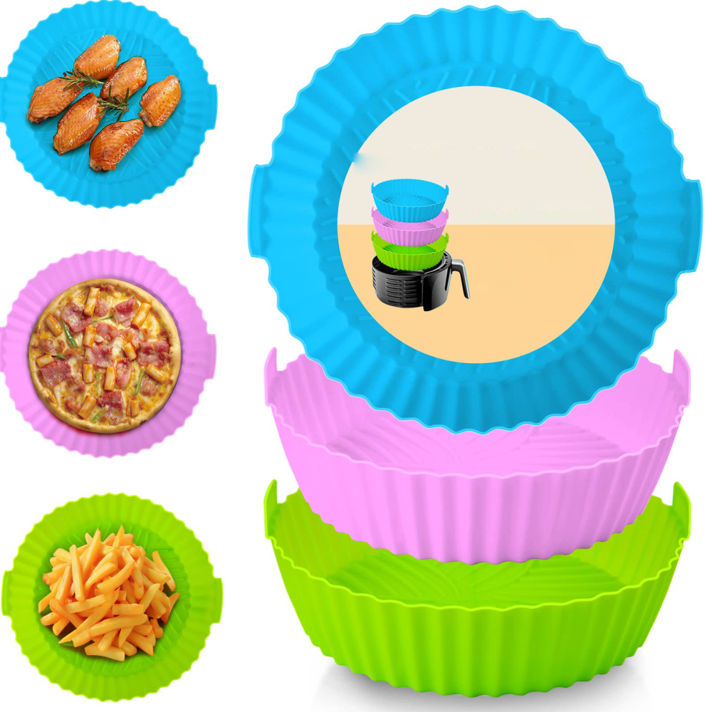 Ein farbenfrohes Bild zeigt Airfryer-Zubehör: blaue, rosa und grüne Silikonkörbe. Außerdem gekochte Speisen wie Wings, Pizza und Pommes.