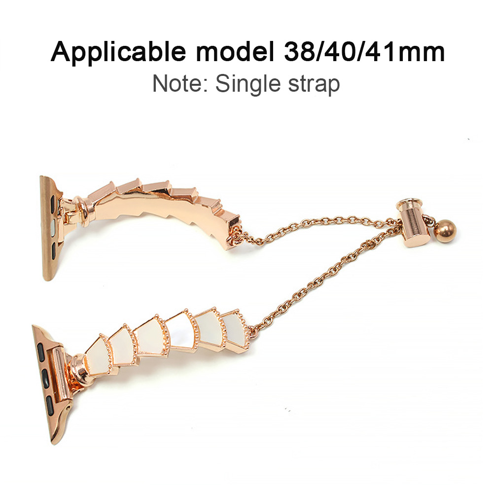 Ein roségoldenes Armband mit Kette. Das Armband ist mit weißen Intarsien versehen. Text oben: Anwendbares Modell 38/40/41mm.