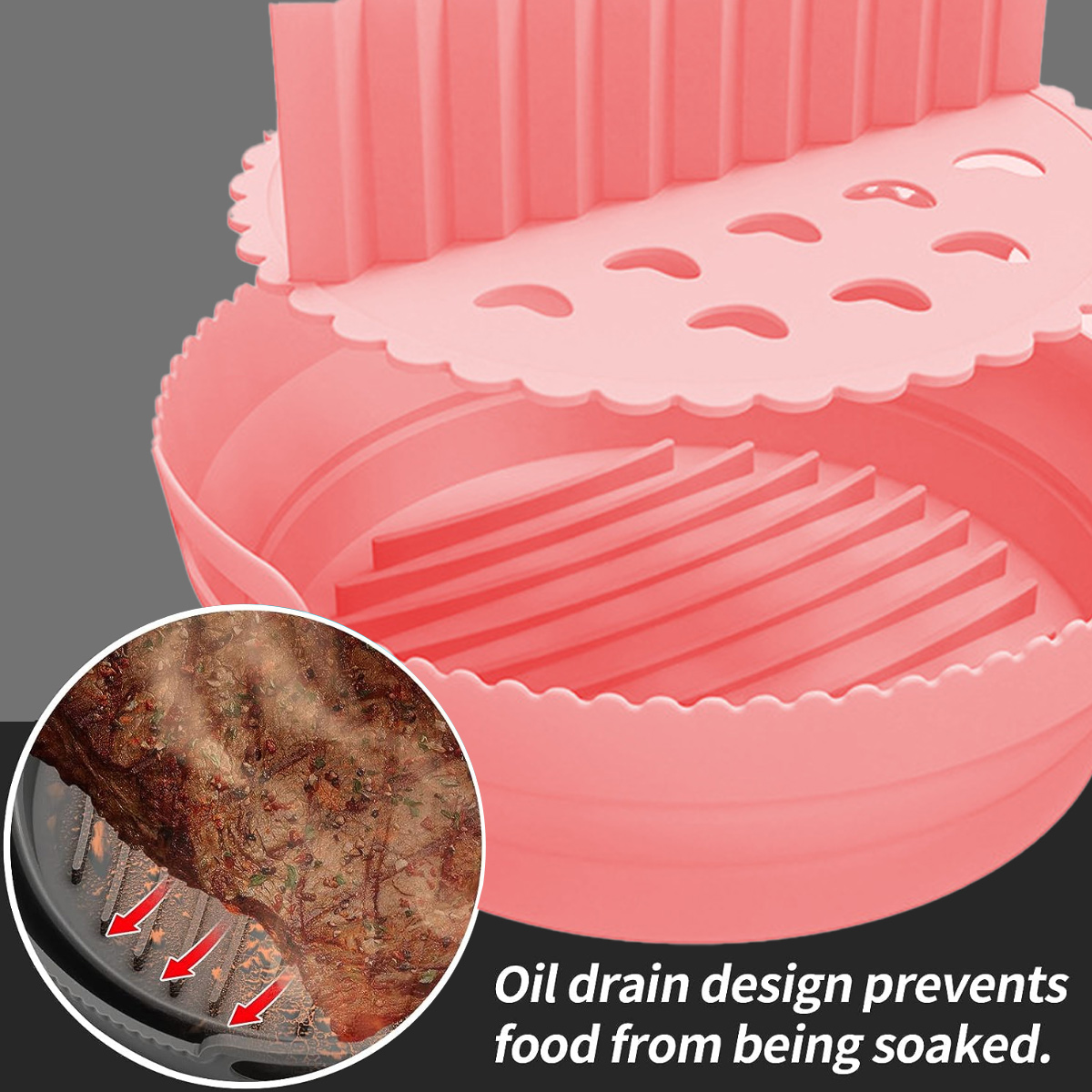 Ein rosa Silikon-Zubehör für die Heißluftfritteuse mit Fleischprobe in einem schwarzen Grill. Pfeile zeigen die Ölabfuhr.
