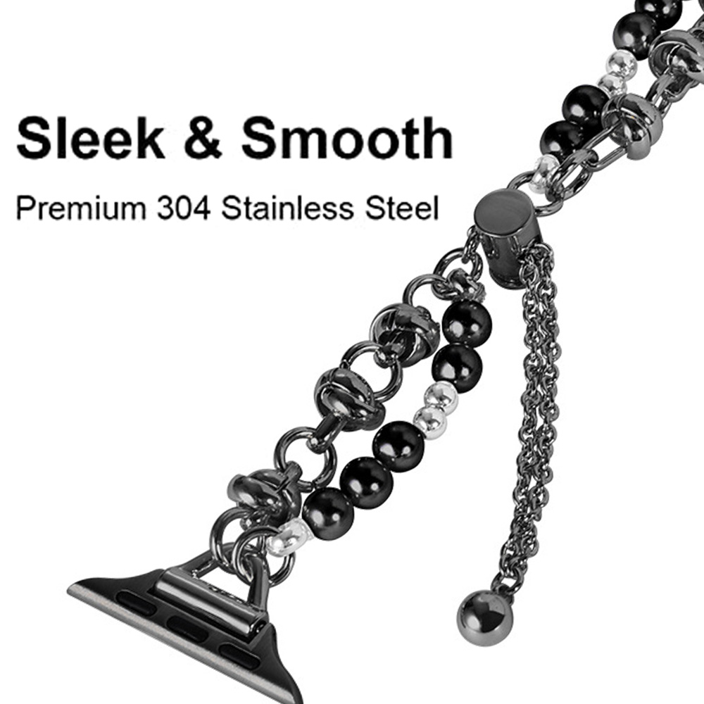 Nahaufnahme eines Uhrenarmbands mit schwarzen Perlen, silbernen Kettengliedern und einer Stahlschließe. Text lautet 'Sleek & Smooth' und 'Premium 304 Stainless Steel'.