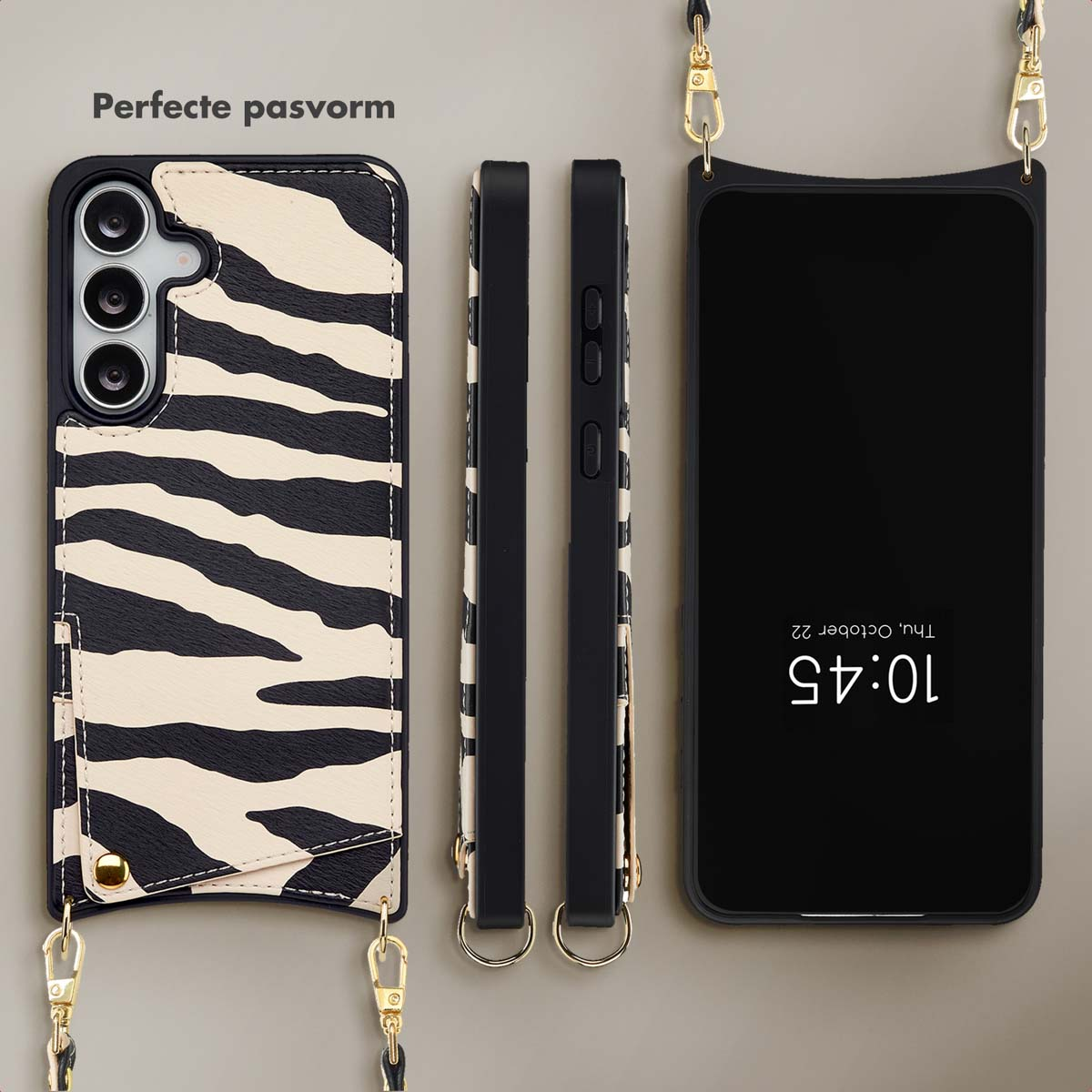 Hoesjes met zebrapatroon, een telefoon en een mobiele telefoon met de tijd 10:45 op het scherm.