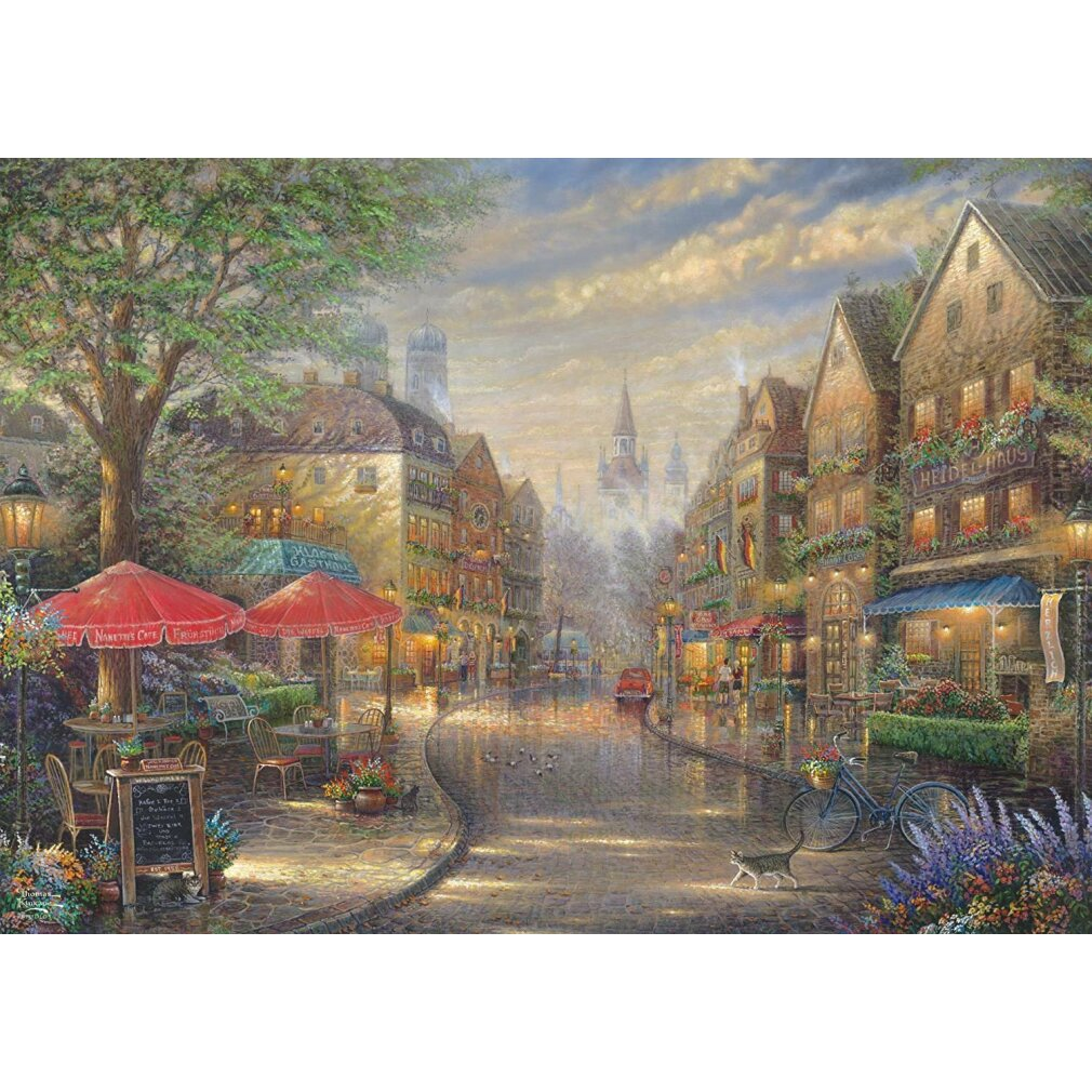 Escena de calle europea con cafés, adoquines y edificios. Sombrillas rojas, bicicleta, gato y pavimento mojado. Cielo nublado.