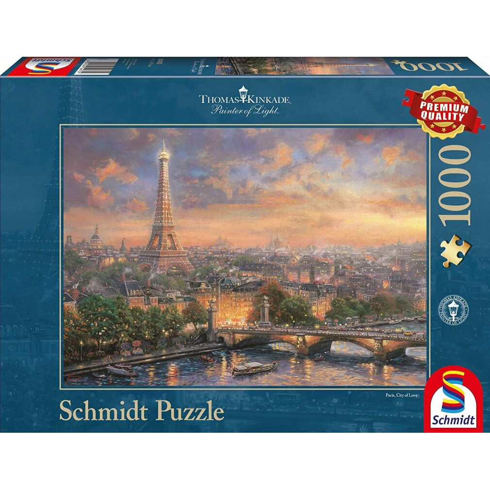 Eine Puzzle-Box mit einem Stadtbild von Paris mit dem Eiffelturm, einem Fluss, Brücken und Gebäuden bei Sonnenuntergang.