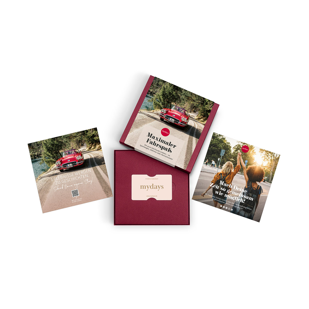 Das Bild zeigt einen roten Cabrio, Geschenkboxen mit 'mydays'-Logo und Personen. Texte beinhalten 'Maximaler Fahrspass' und 'Mach Deine Zeit'.