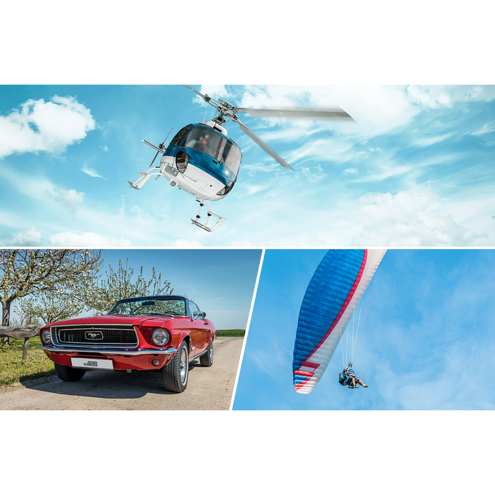 Ein Hubschrauber fliegt am blauen Himmel. Ein rotes Auto parkt auf einer unbefestigten Straße. Eine Person paragleitet.