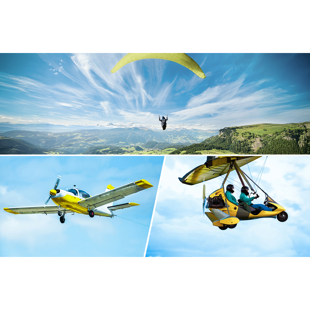 Luftfahrtszene: Gleitschirmflieger, kleines Flugzeug und ein motorisiertes Hängegleiter am Himmel. Berge und Wolken im Hintergrund.