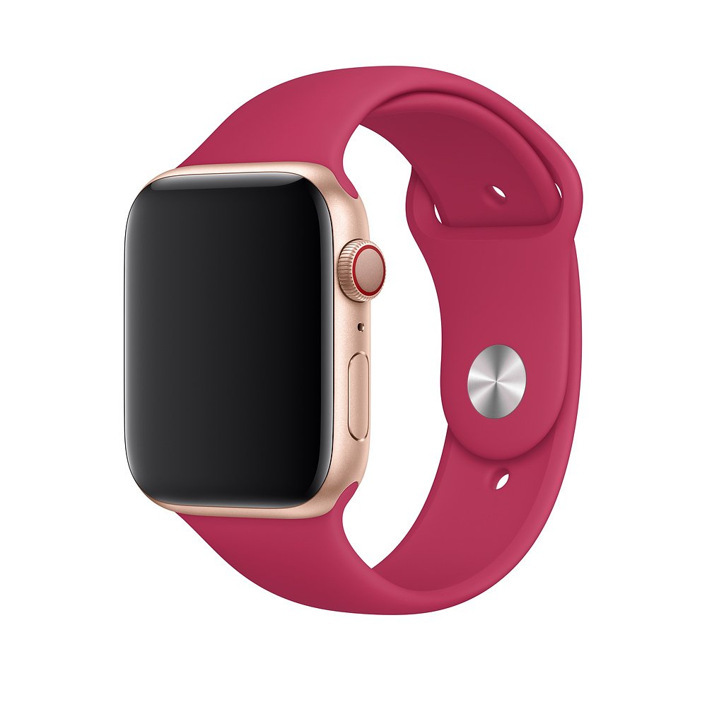 Une Apple Watch dorée avec un écran sombre et un bracelet rouge. Le bracelet est connecté à la montre, isolée sur fond blanc.