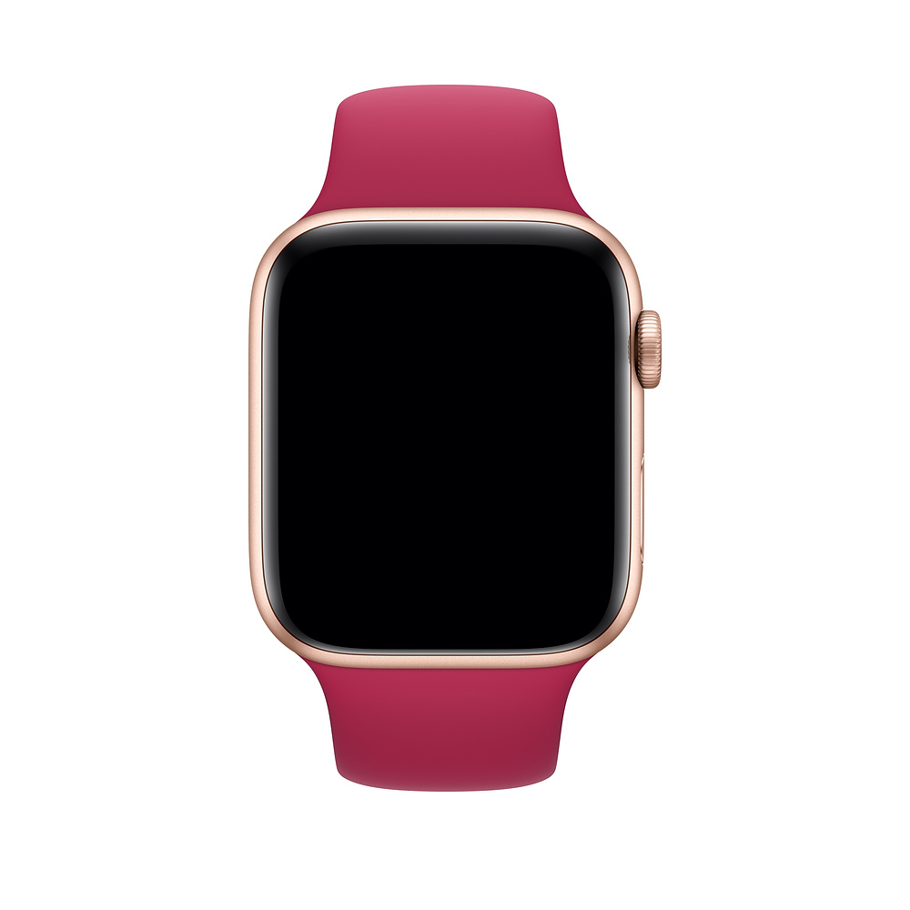Une Apple Watch or rose avec écran sombre et bracelet rouge, centrée sur fond blanc.
