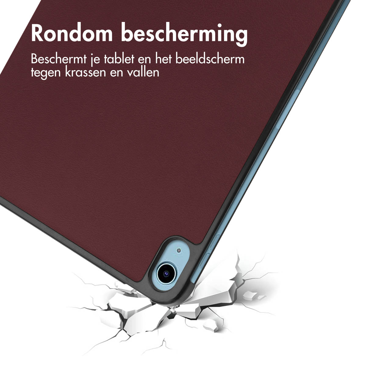 Een tablet in een beschermhoes, waarvan de kleur donker bordeauxrood is. De tablet valt en breekt de grond.