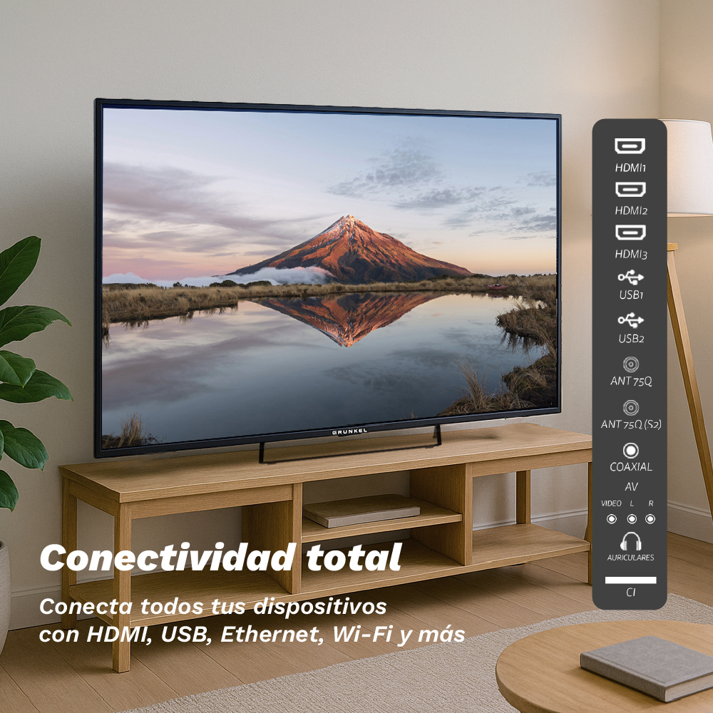 Un televisor muestra un paisaje montañoso sobre un mueble de madera. Tiene varios puertos de entrada y el texto dice 'Conectividad Total'.