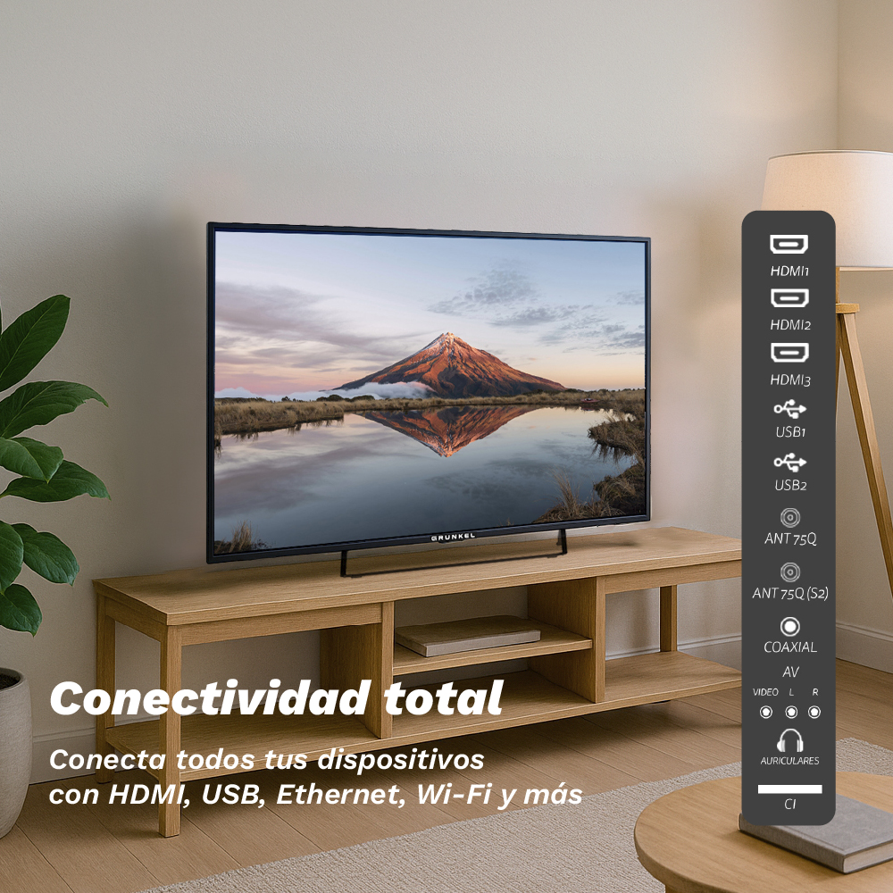 Un televisor muestra una montaña reflejada en el agua. Se encuentra en un soporte de madera. El texto dice: Conectividad total.