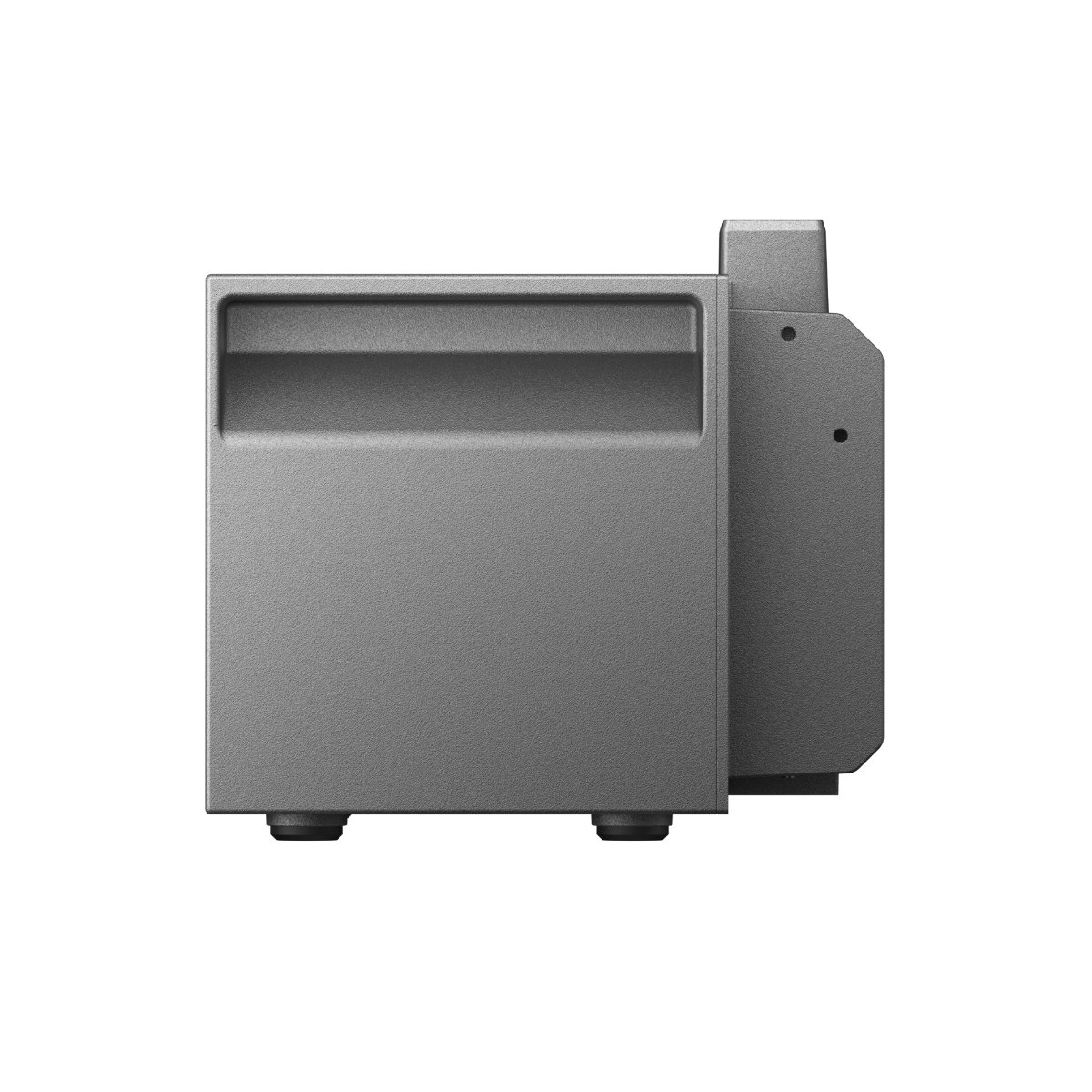 Ein graues rechteckiges Gerät, möglicherweise ein Drucker oder Server, mit einem eingelassenen Griff oben und zwei runden Füßen.