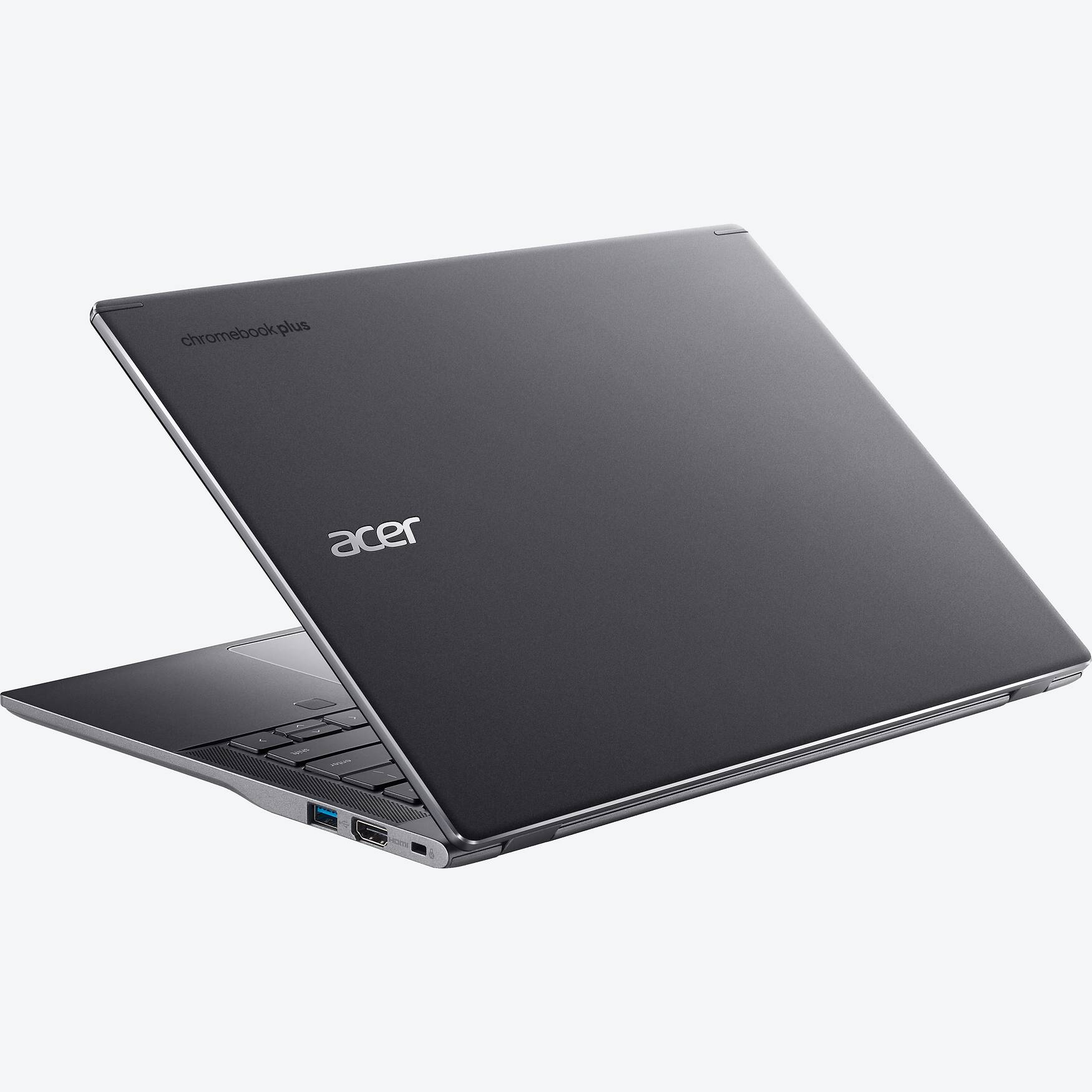 Ciemnoszary laptop Acer Chromebook Plus. Ekran jest otwarty, wyświetlając klawiaturę i logo Acer.