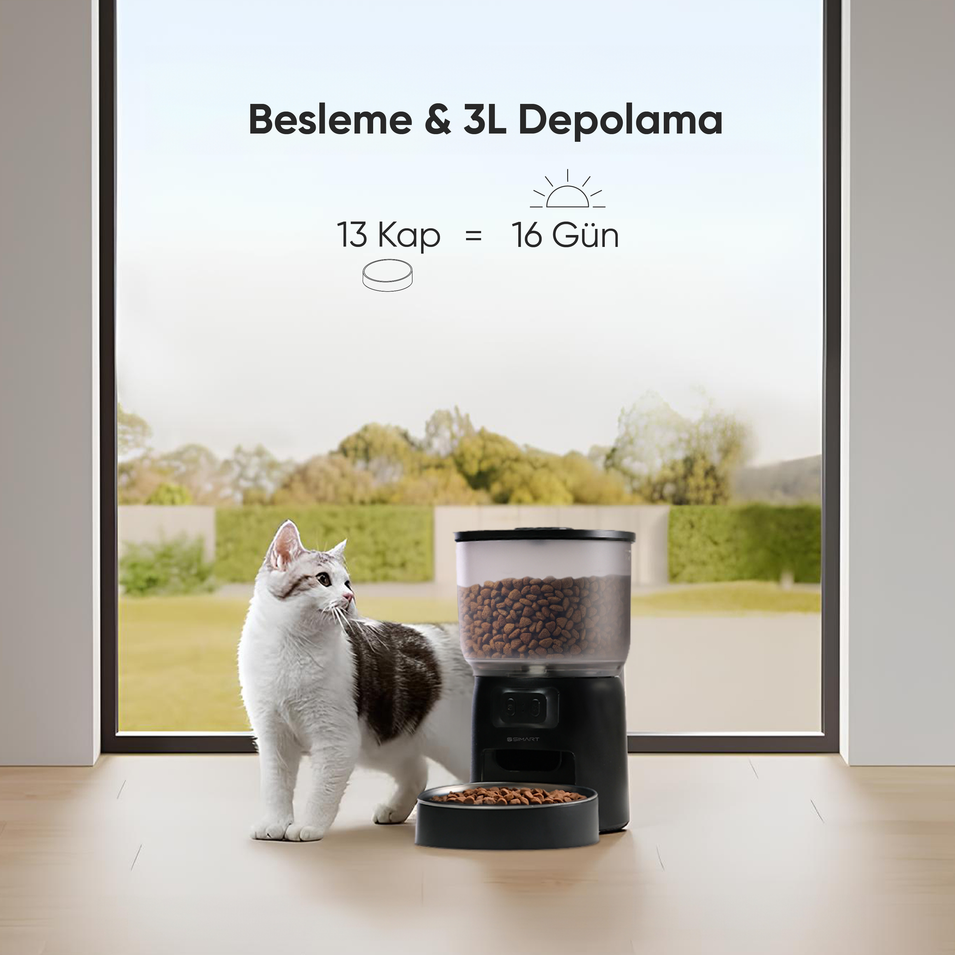 Bir kedi, mama kabı ile birlikte siyah bir evcil hayvan besleyici yanında duruyor. Yukarıdaki metin şunları söylüyor: Besleme ve 3L Depolama.