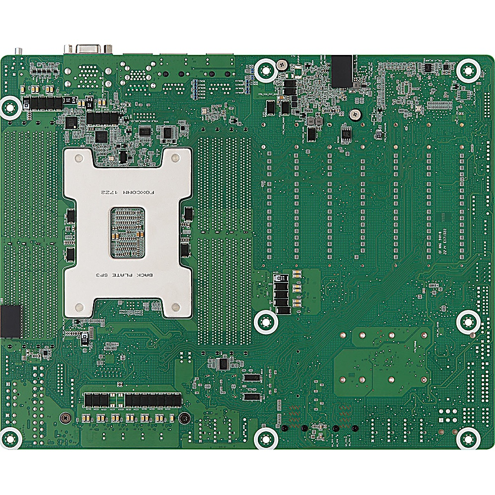 Un circuito stampato verde con vari componenti, tra cui chip, connettori e un socket centrale etichettato 'FOXCONN 1722'.