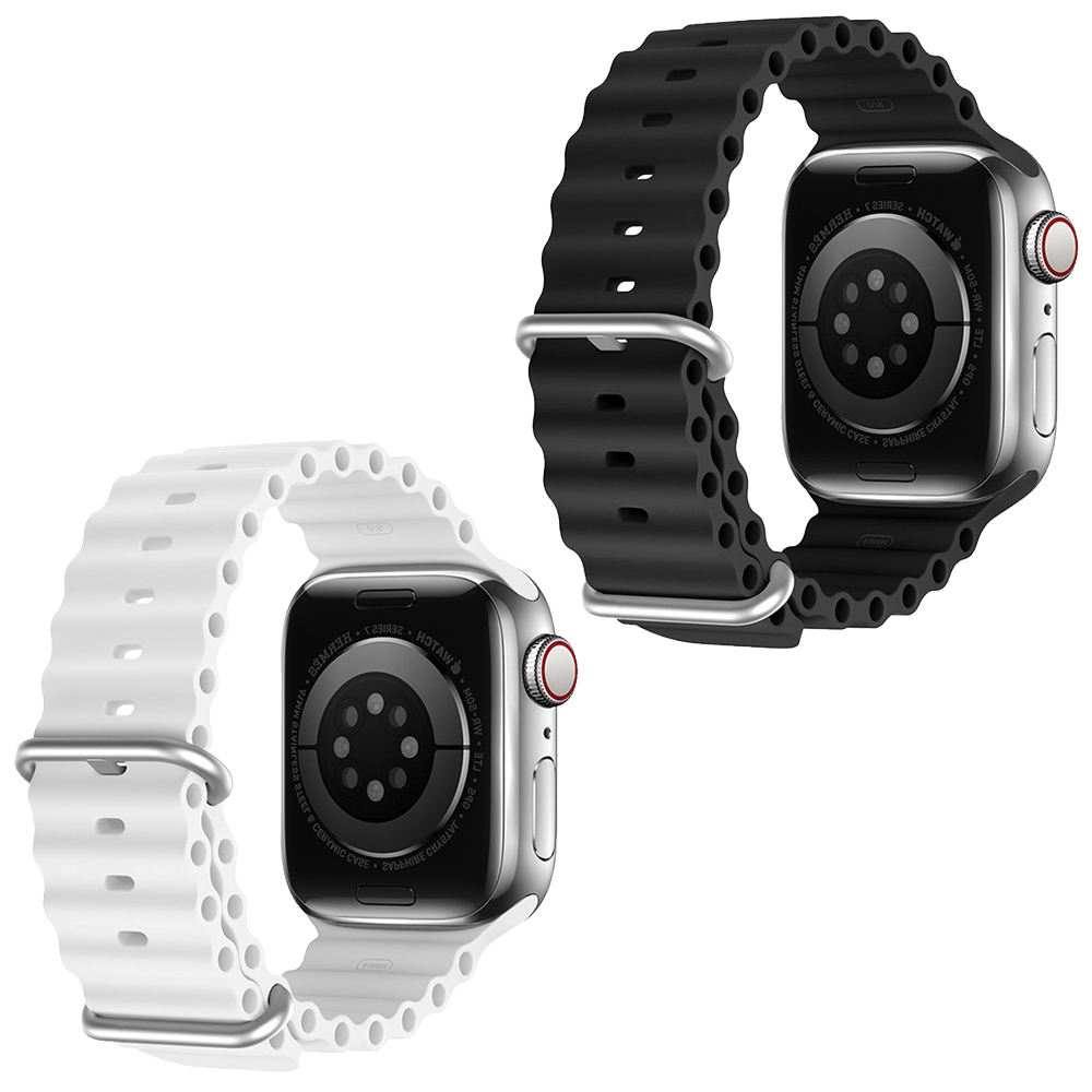 Zwei Smartwatches mit Armbändern, eine weiße, eine schwarze. Die schwarze Uhr liegt etwas über der weißen.