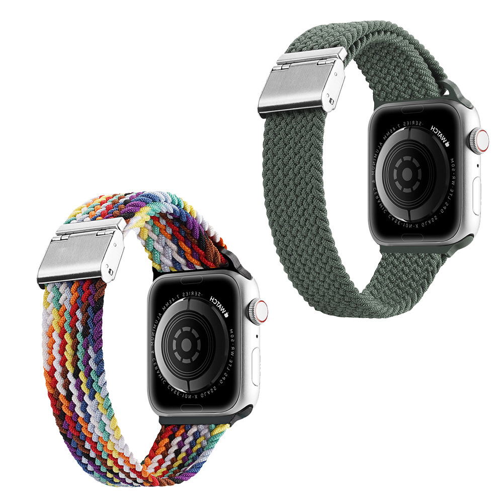 Zwei Smartwatches mit unterschiedlich farbigen Armbändern. Eines ist grün, das andere ist mehrfarbig. Beide haben silberne Verschlüsse und schwarze Bildschirme.
