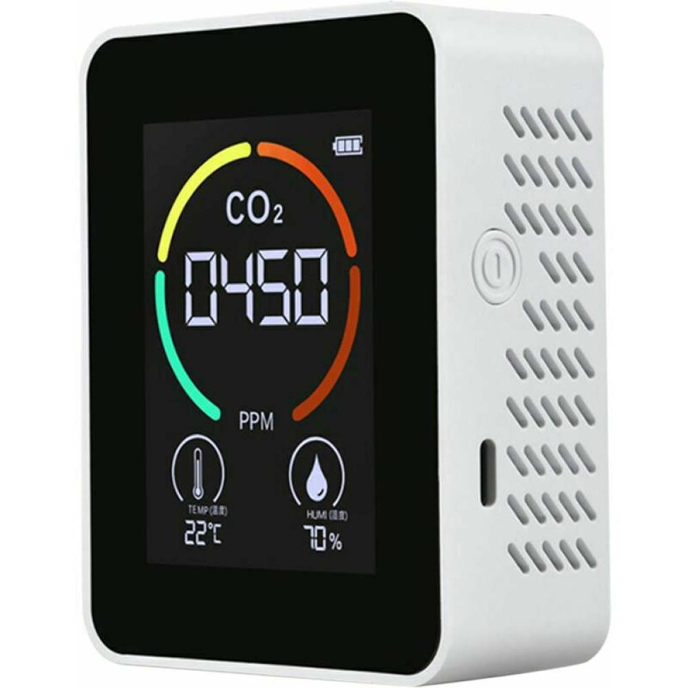 Ein weißer CO2-Monitor zeigt 450 PPM an. Es zeigt eine Temperatur von 22°C und eine Luftfeuchtigkeit von 70%. Das Gerät hat einen schwarzen Bildschirm und ein weißes Gehäuse.