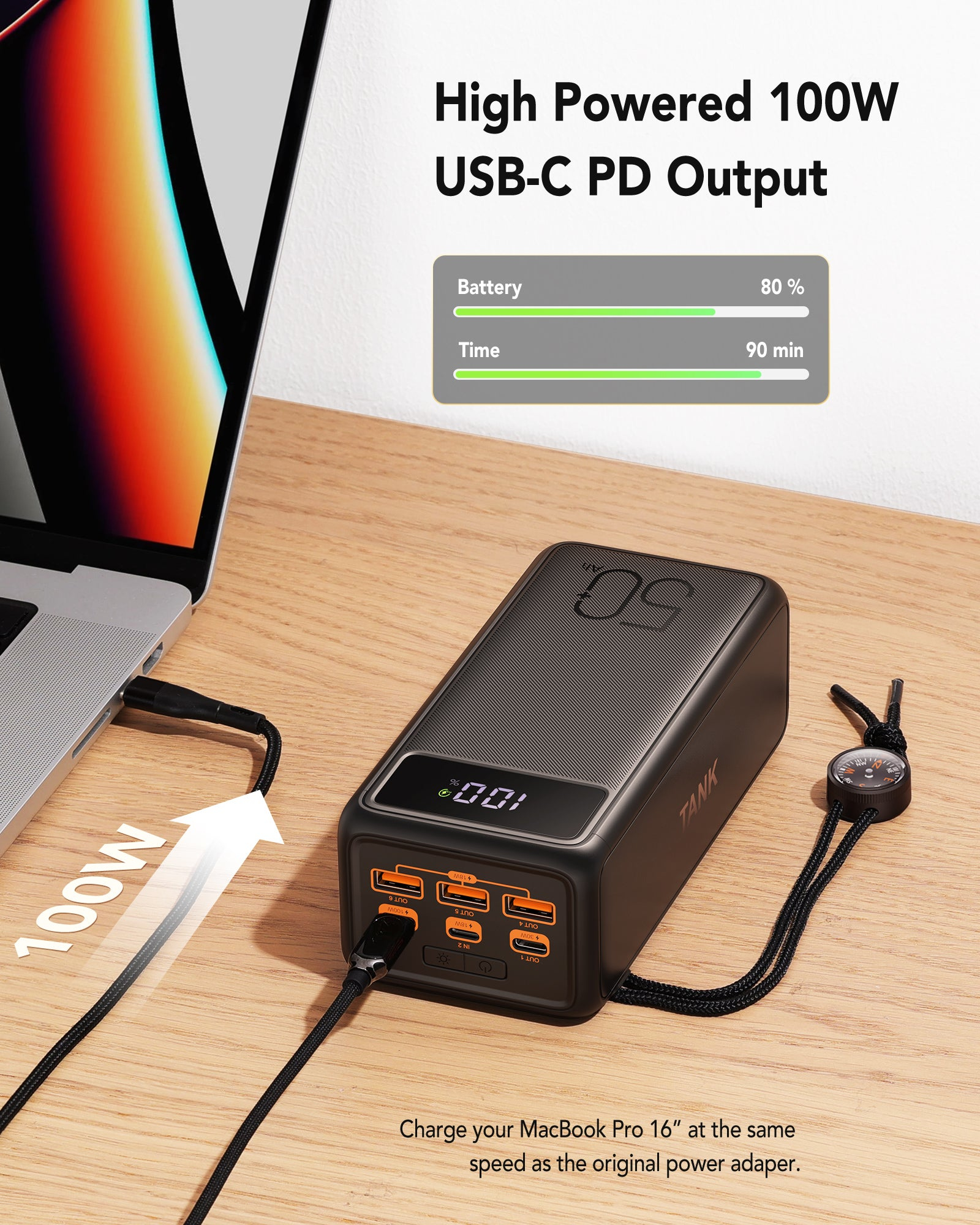 Un laptop è collegato a un power bank nero con un cavo USB-C, che mostra la batteria e il tempo. Il power bank ha più porte.