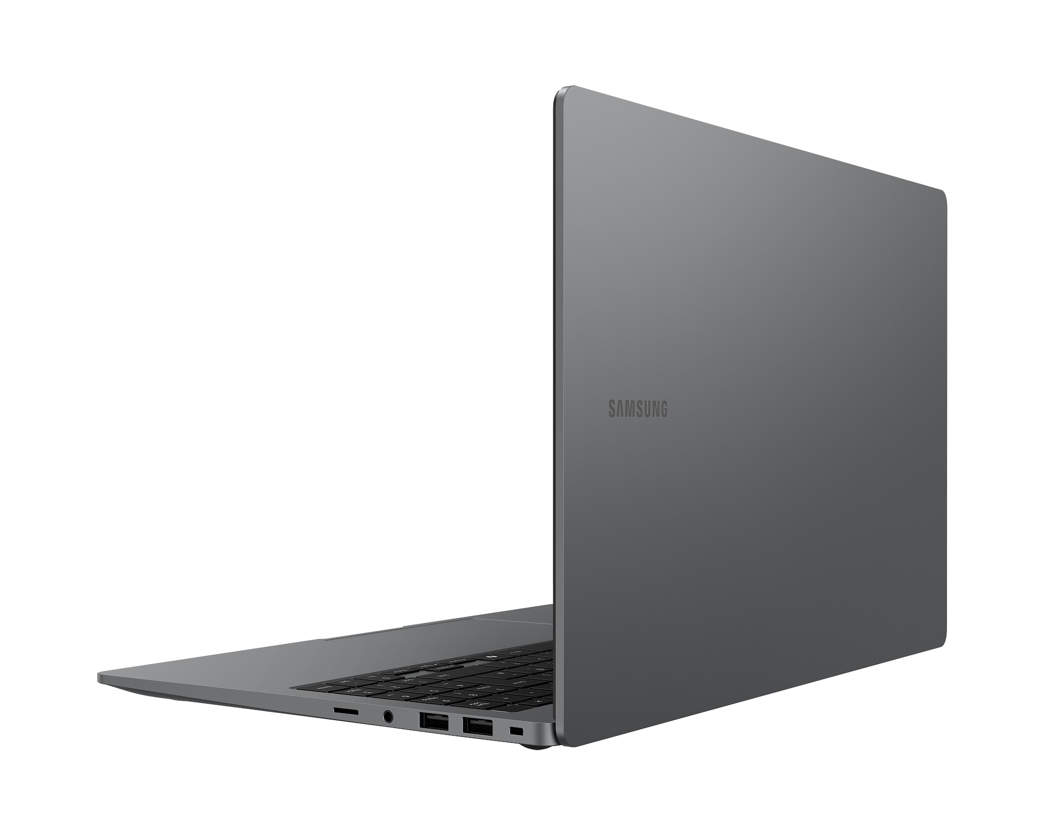 Laptop Samsung grigio, aperto ad angolo. Lo schermo mostra il logo Samsung. Tastiera visibile. Sfondo bianco.