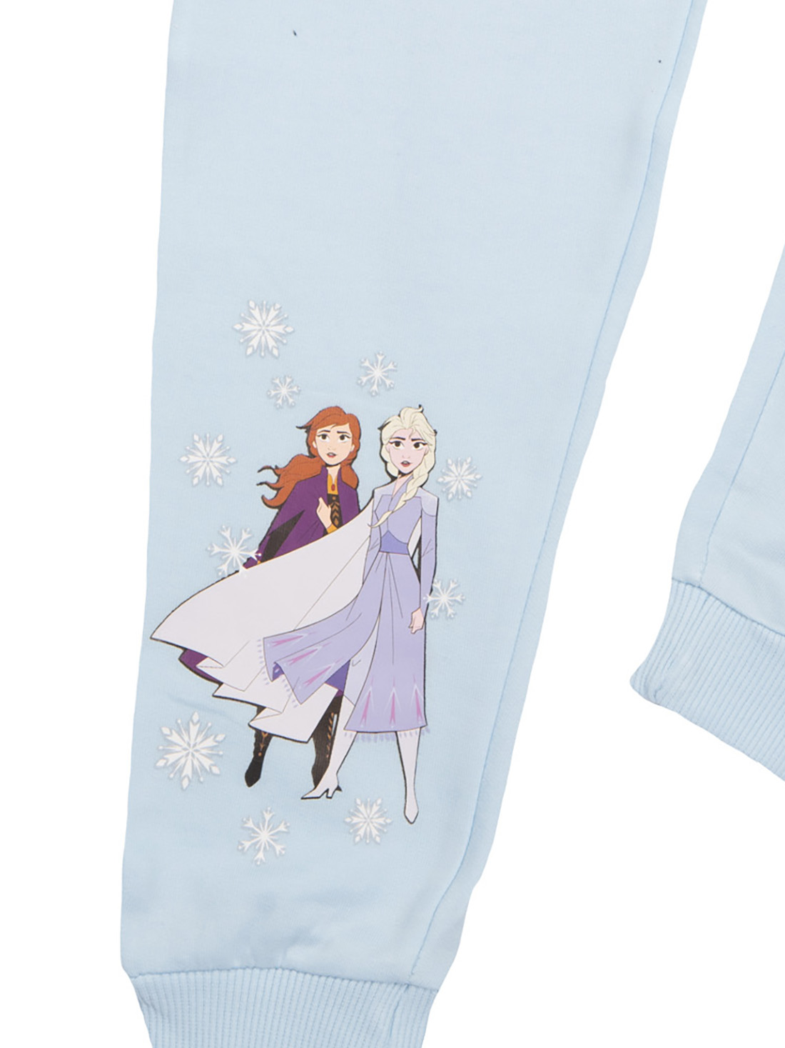 Hellblaue Hose mit Frozen-Aufdruck. Anna und Elsa sind abgebildet. Weiße Schneeflocken sind um die Charaktere verstreut.