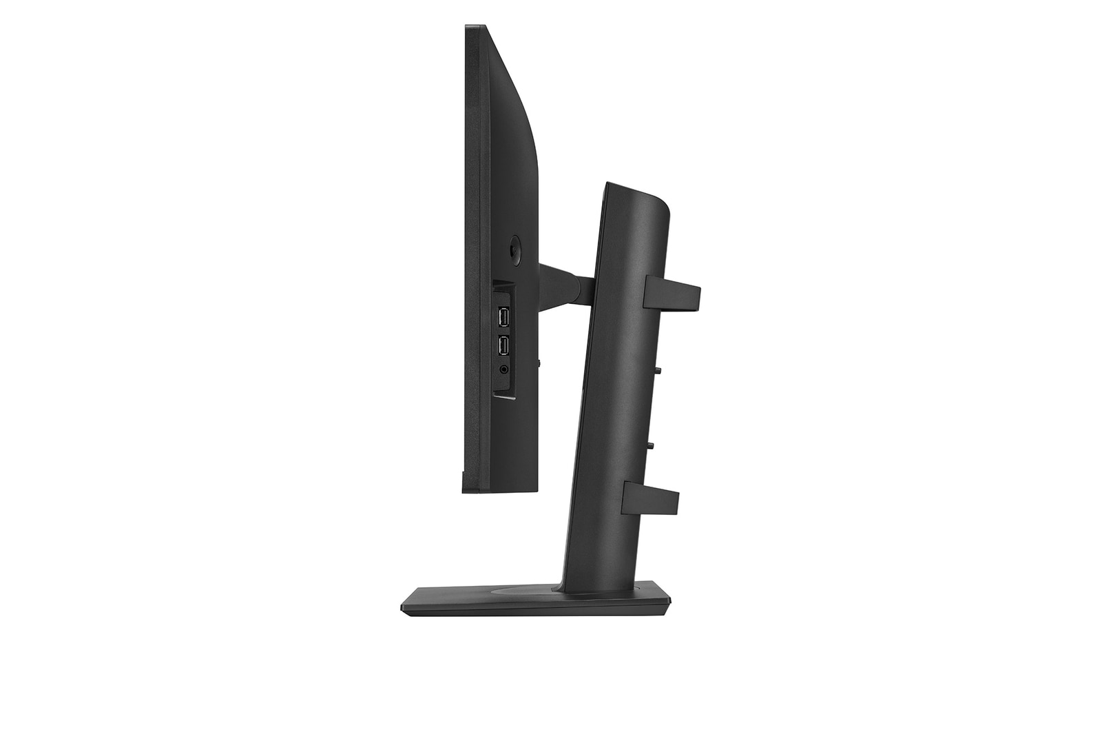 Una vista laterale di un monitor di computer nero con supporto. Lo schermo è sottile, con porte laterali. Anche il supporto è nero.