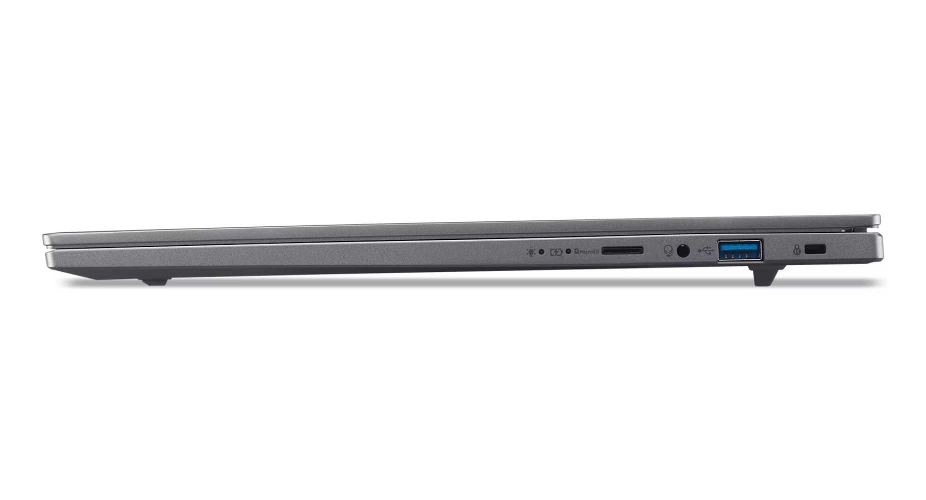 Un laptop grigio è visto di lato. Ha diverse porte, tra cui USB, e uno slot microSD. Il laptop è chiuso.