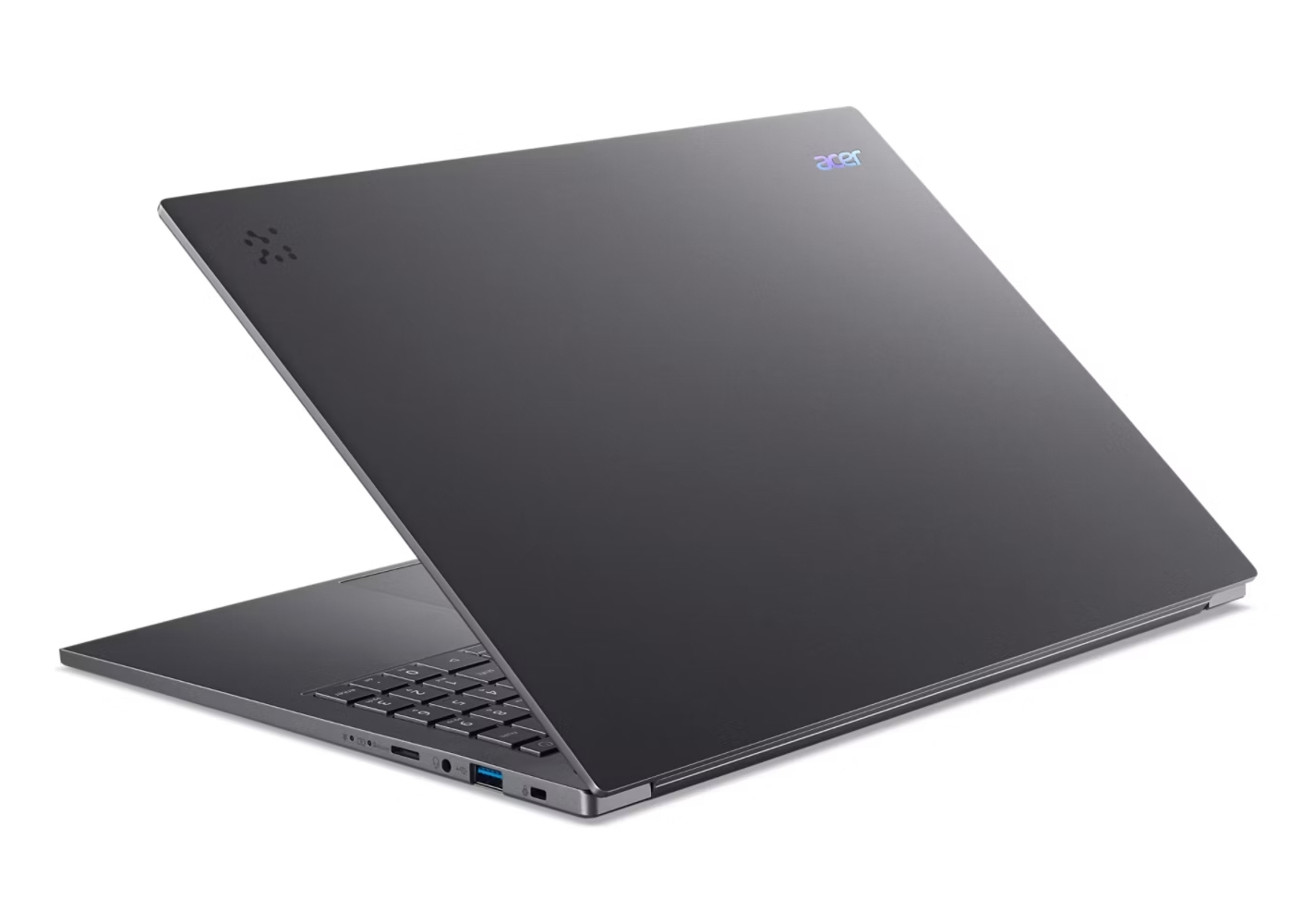 Un laptop Acer grigio scuro è aperto, mostrando la tastiera e il retro con il logo Acer e un design.