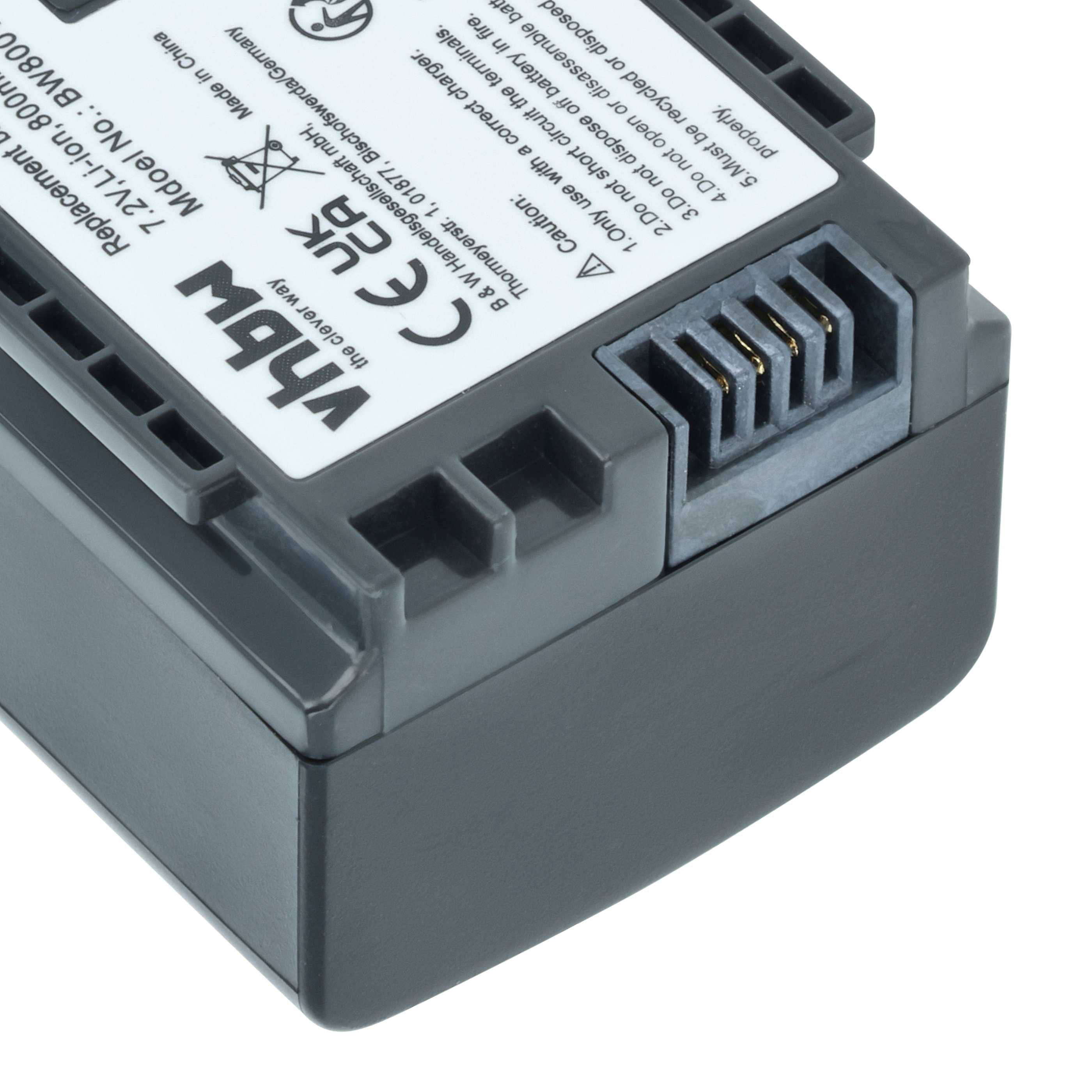 Nahaufnahme einer grauen Batterie mit weißem Text, Anschluss und weißem Hintergrund.