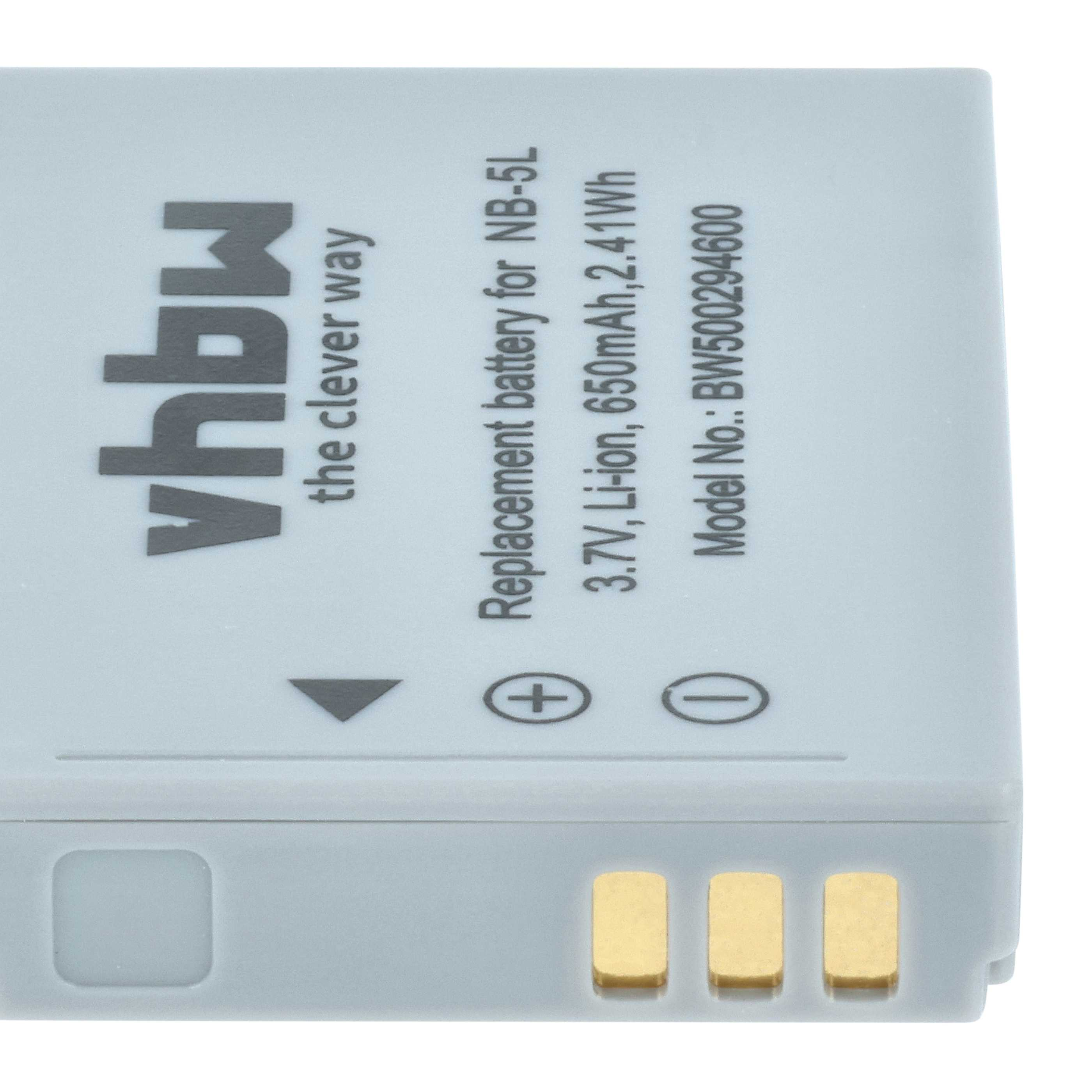 Ein graues Akkupack mit der Aufschrift 'vhbw' und 'Ersatzbatterie für NB-5L'. Es hat drei goldene Anschlüsse.