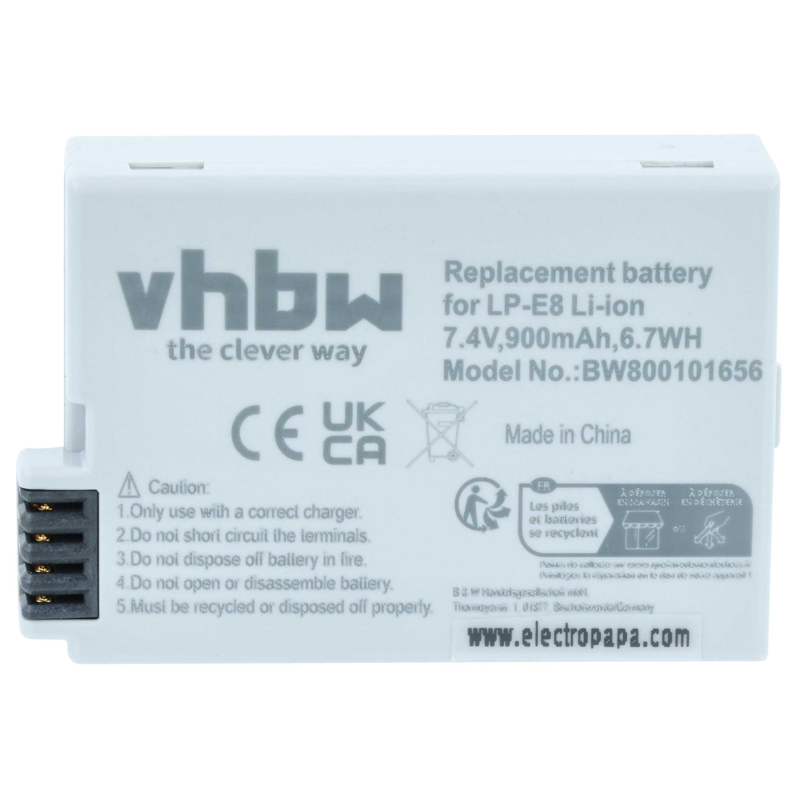 Ein weißer Akku mit Text, 'vhbw' und 'Ersatzbatterie' ist abgebildet. Er hat Sicherheitshinweise und Recycling-Symbole.