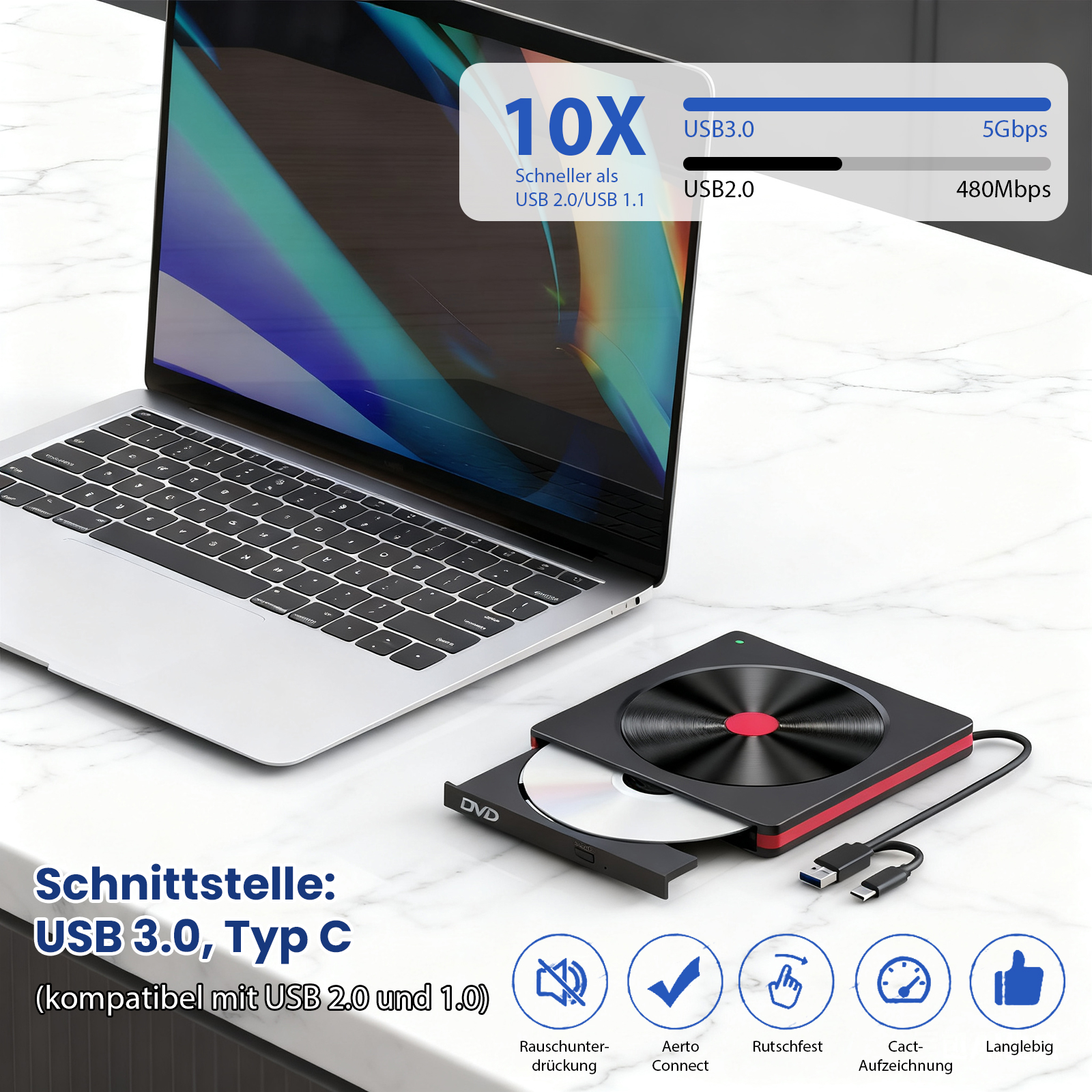 Ein Laptop und ein DVD-Player stehen auf einer Marmoroberfläche. Der DVD-Player ist schwarz und rot.