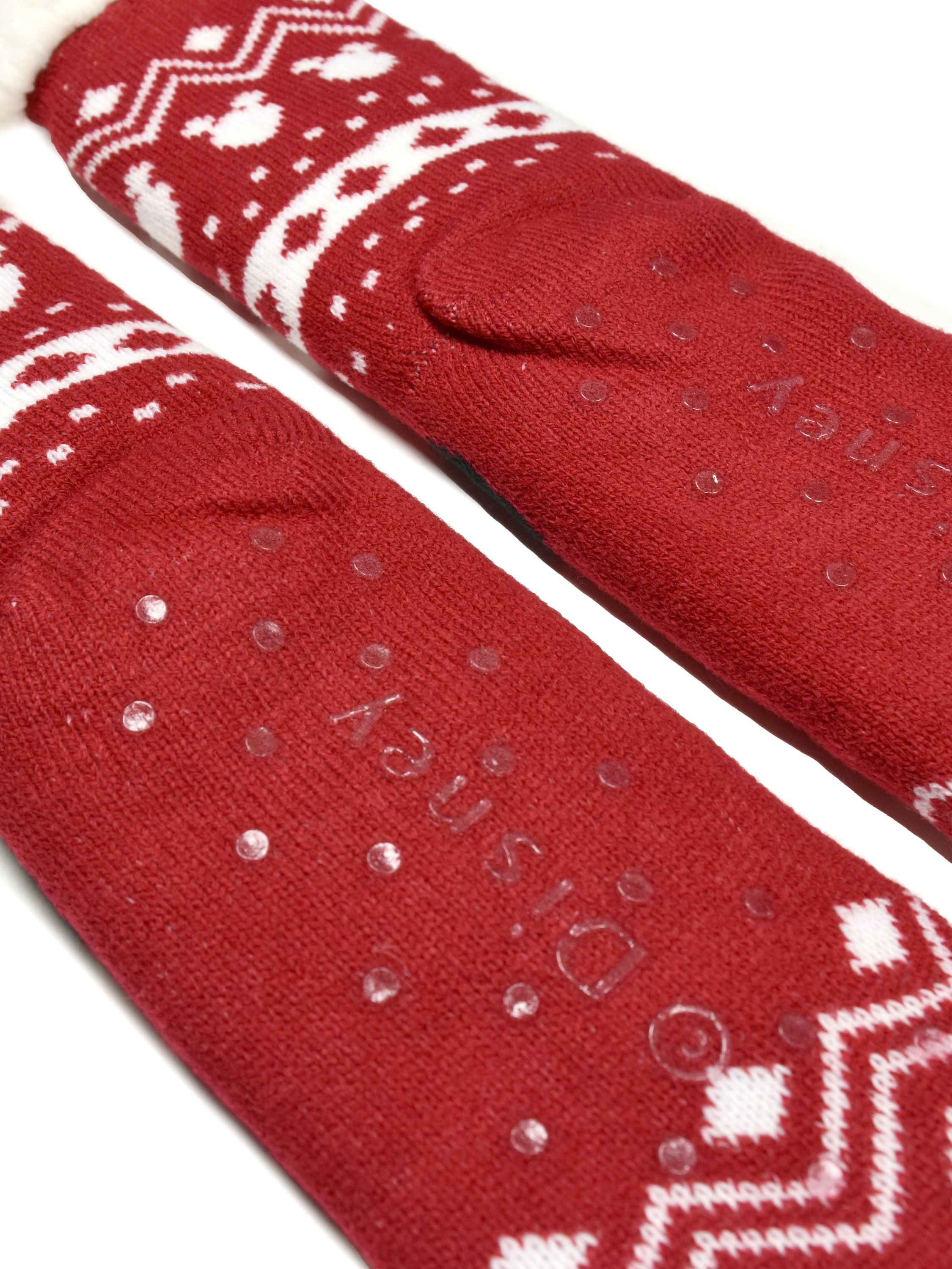 Rote Socken mit weißem Muster und Disney-Logo, Anti-Rutsch-Punkte, weißer Hintergrund.