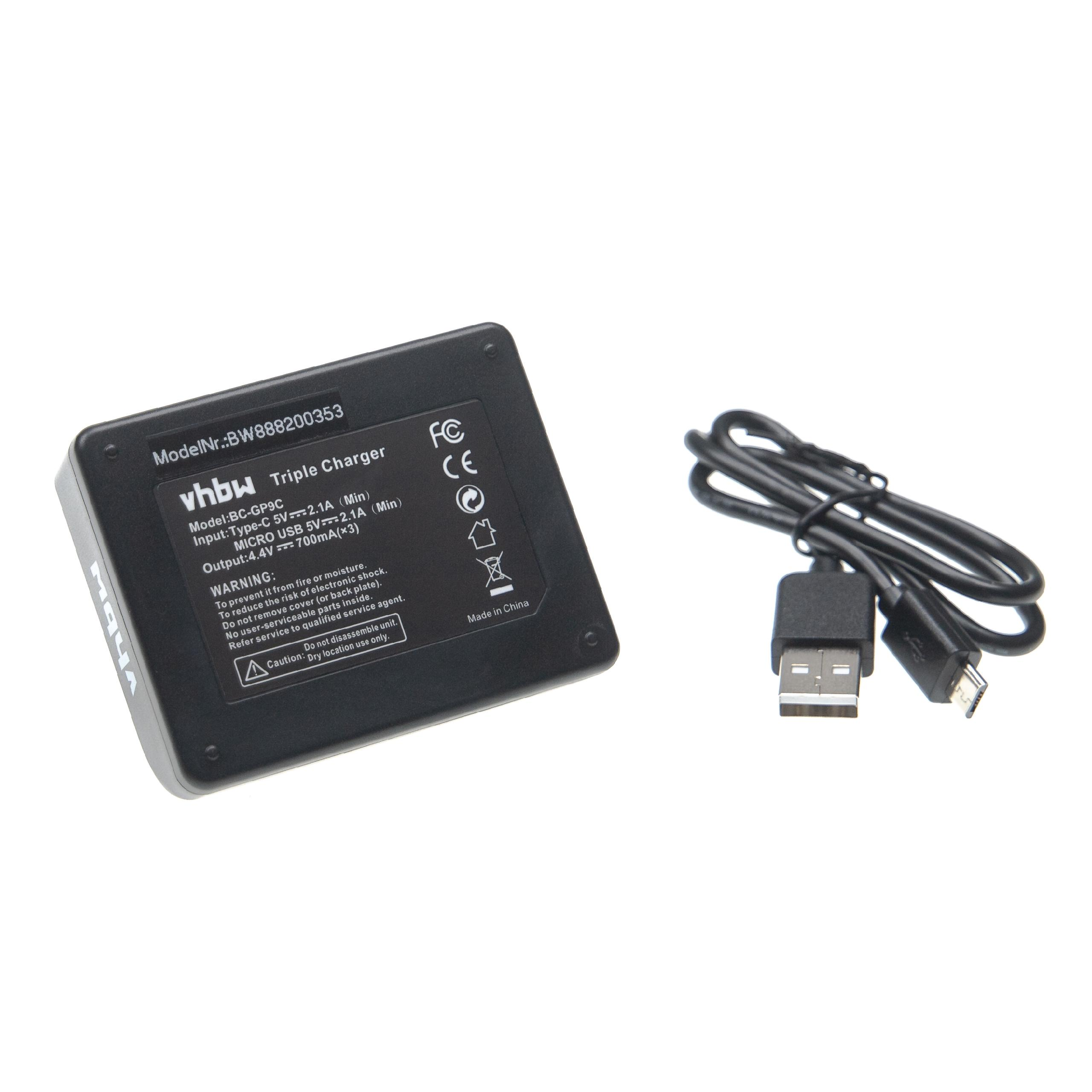 Schwarzes Dreifachladegerät mit USB-Kabel auf weißem Hintergrund. Ladegerät hat Text und Symbole.