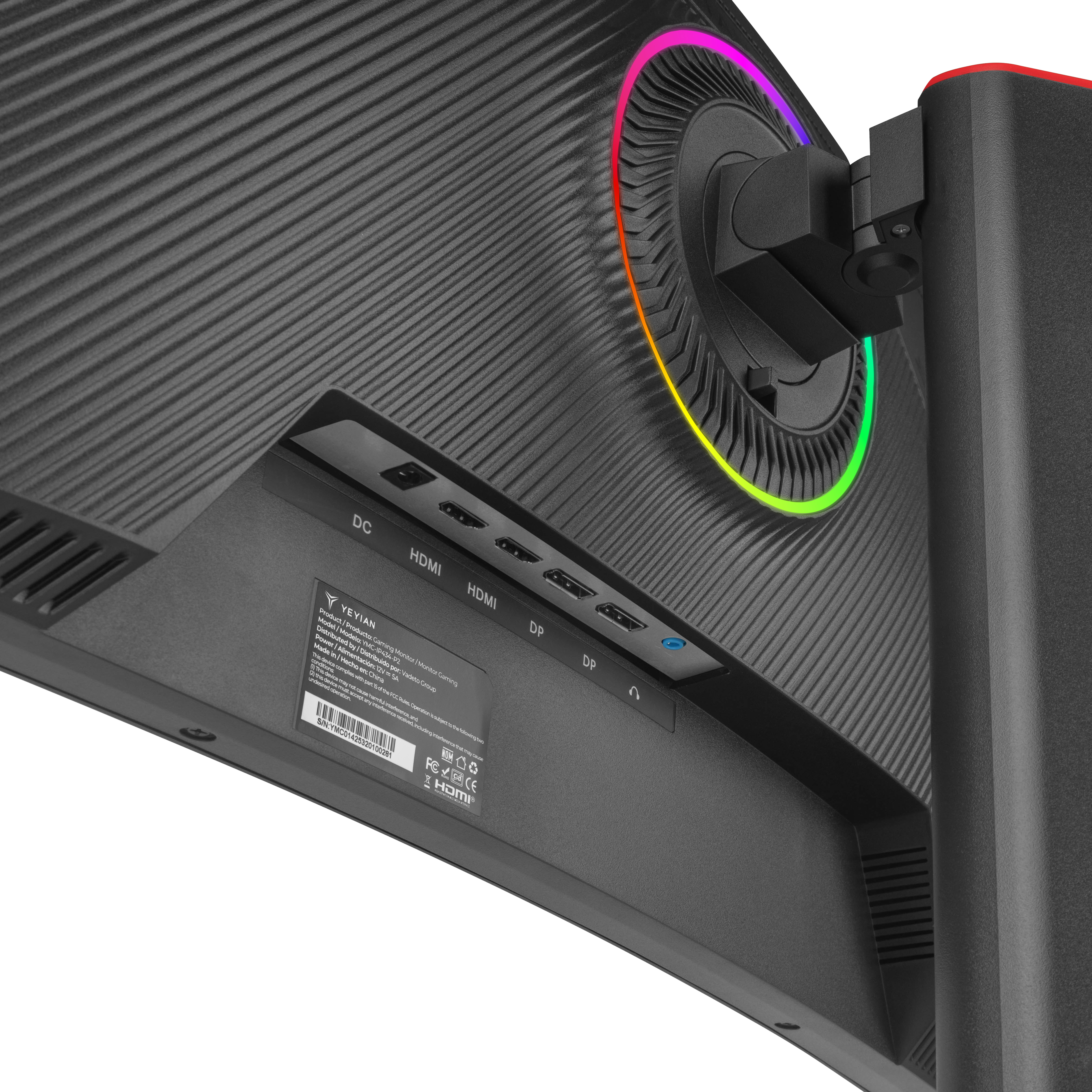 Vista trasera de un monitor gaming. Muestra puertos, una etiqueta y un anillo colorido en la parte posterior.