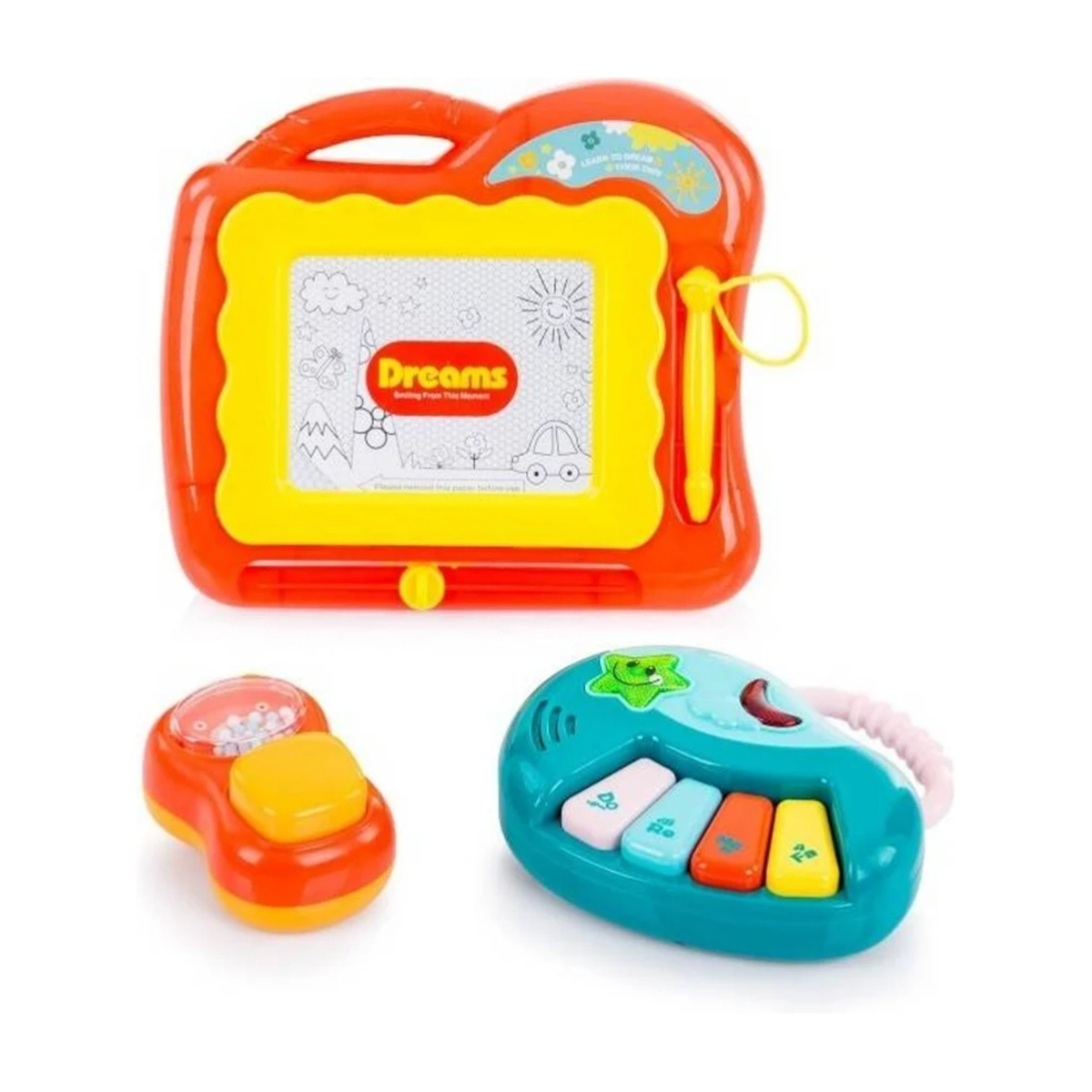 Drei farbenfrohe Spielzeugmusikinstrumente auf weißem Hintergrund. Eine rote Zeichenplatte, ein kleines oranges Spielzeug und ein blaues Spielzeugklavier.