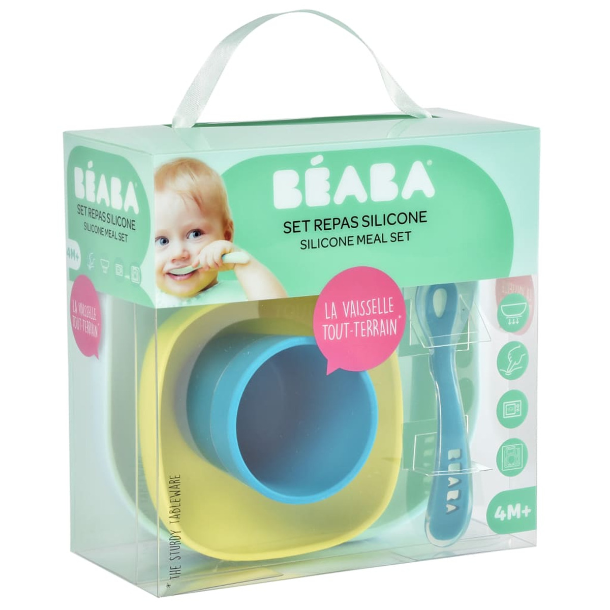 Ein Baby-Ess-Set in einer Box. Enthält eine Schüssel, einen Becher und einen Löffel. Die Box hat einen Griff und zeigt ein Baby.