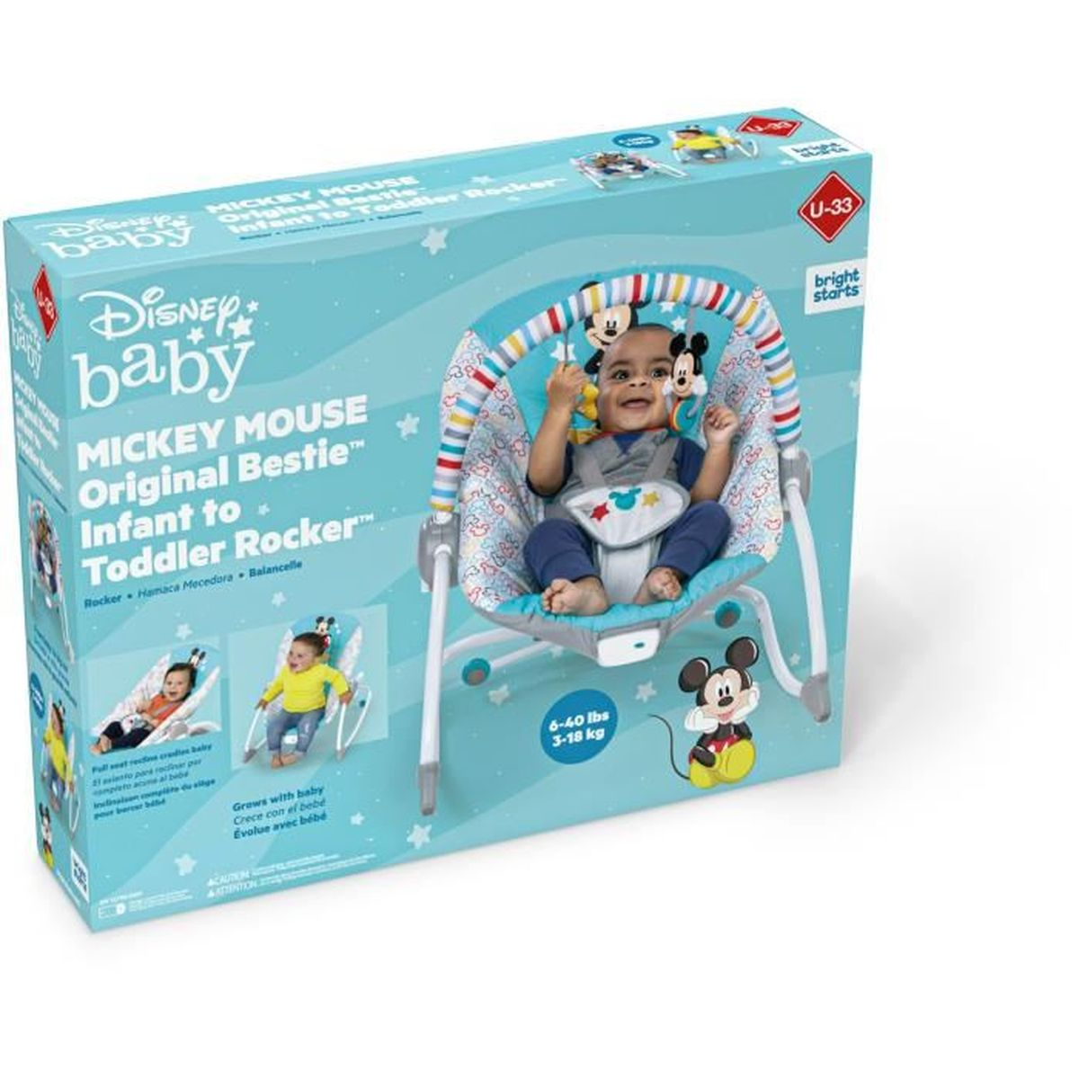 Karton mit Mickey Mouse Babywippe, mit einem Baby darin. Die Schachtel zeigt das Produkt und seine Eigenschaften.
