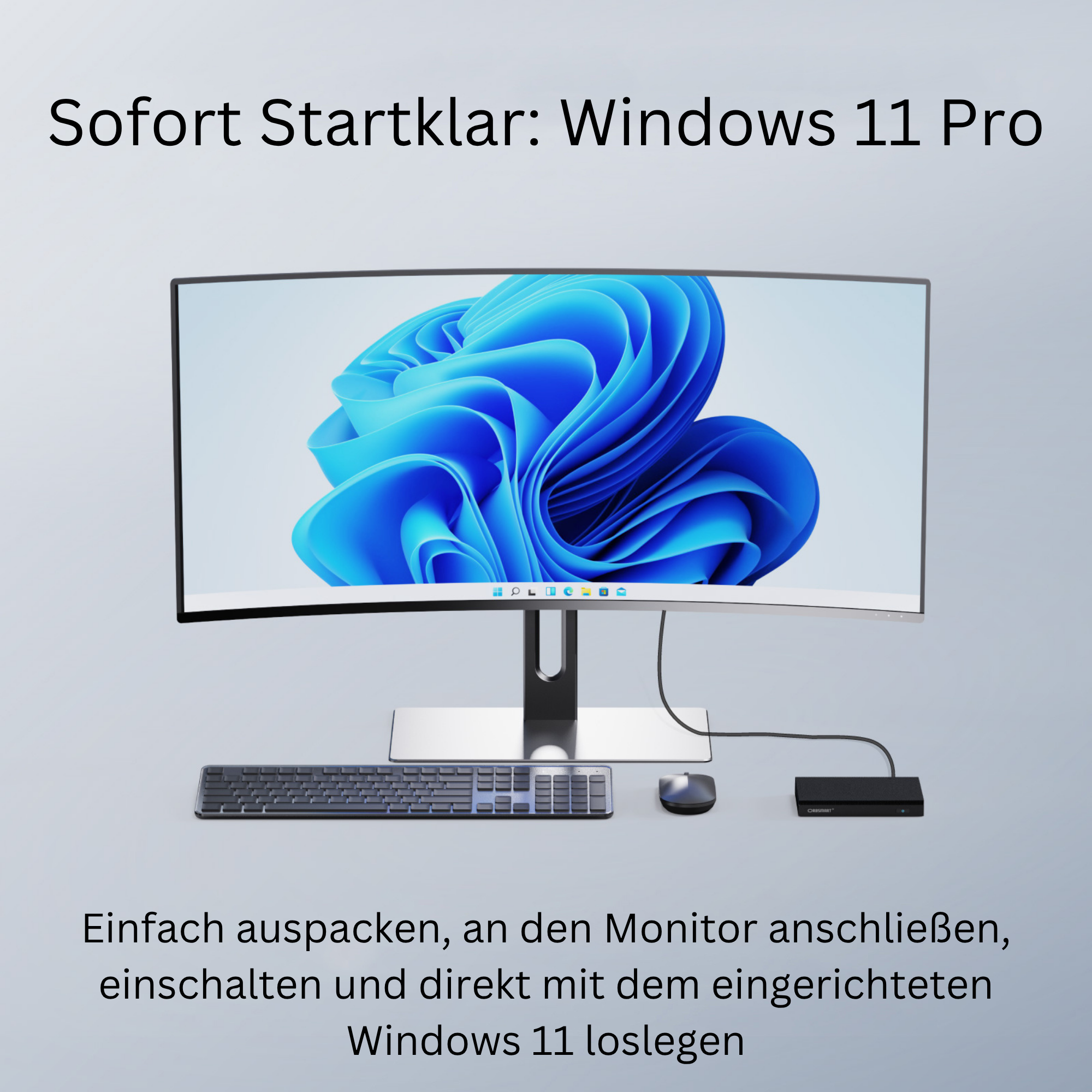 Ein geschwungener Monitor zeigt einen blauen Windows 11-Hintergrund. Tastatur, Maus und ein schwarzes Gerät im Vordergrund.