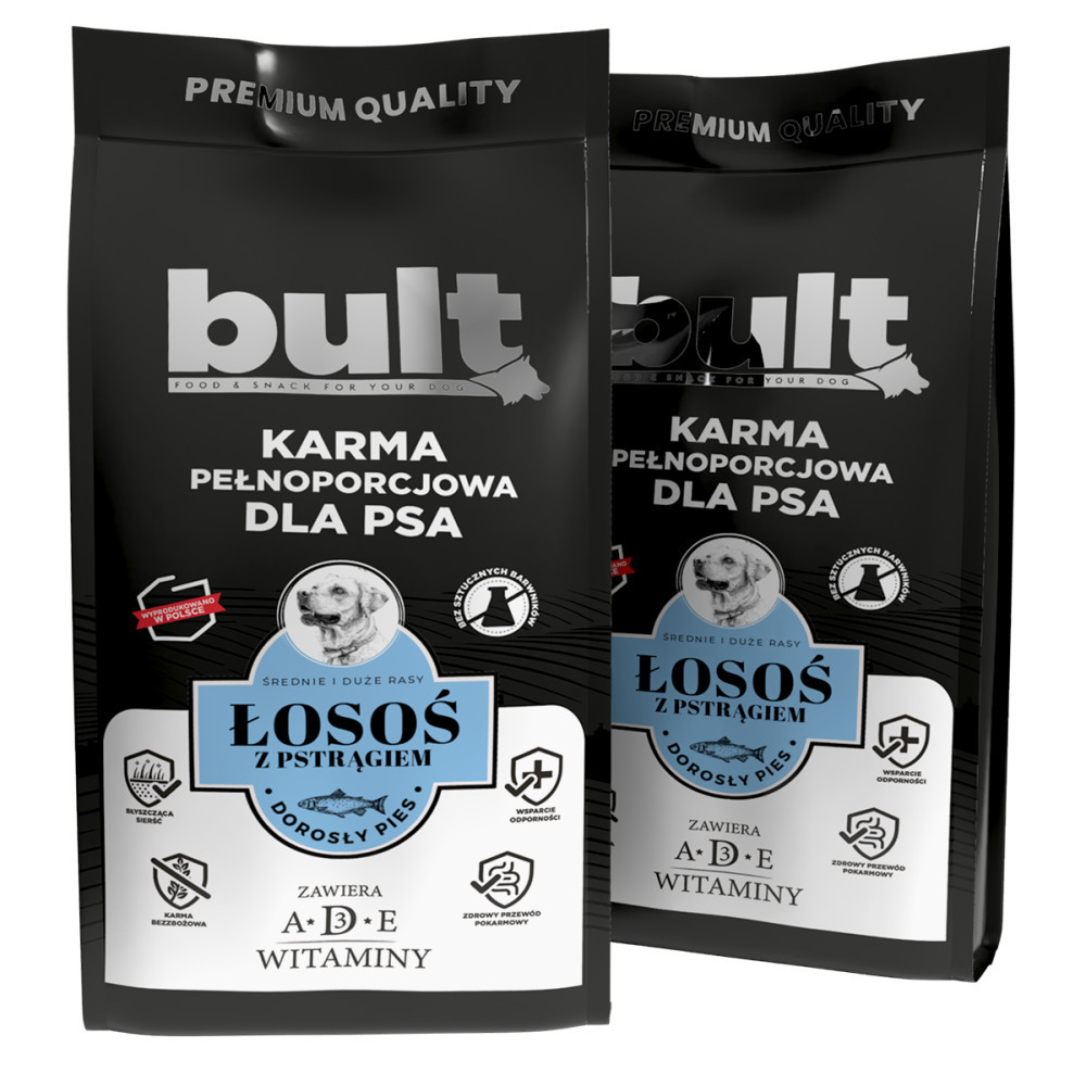 Dos bolsas negras de comida para perros, marca 'bult', con texto en polaco. Contiene salmón y trucha, vitaminas A, D, E, para perros adultos.