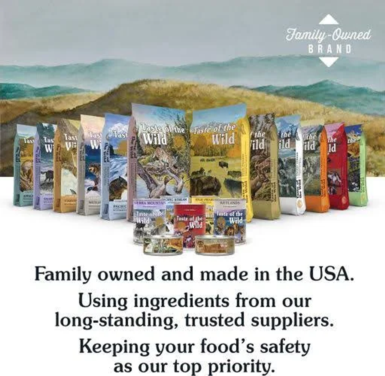 Torby i puszki z karmą dla psów marki 'Taste of the Wild'. Tło przedstawia krajobraz z górami.