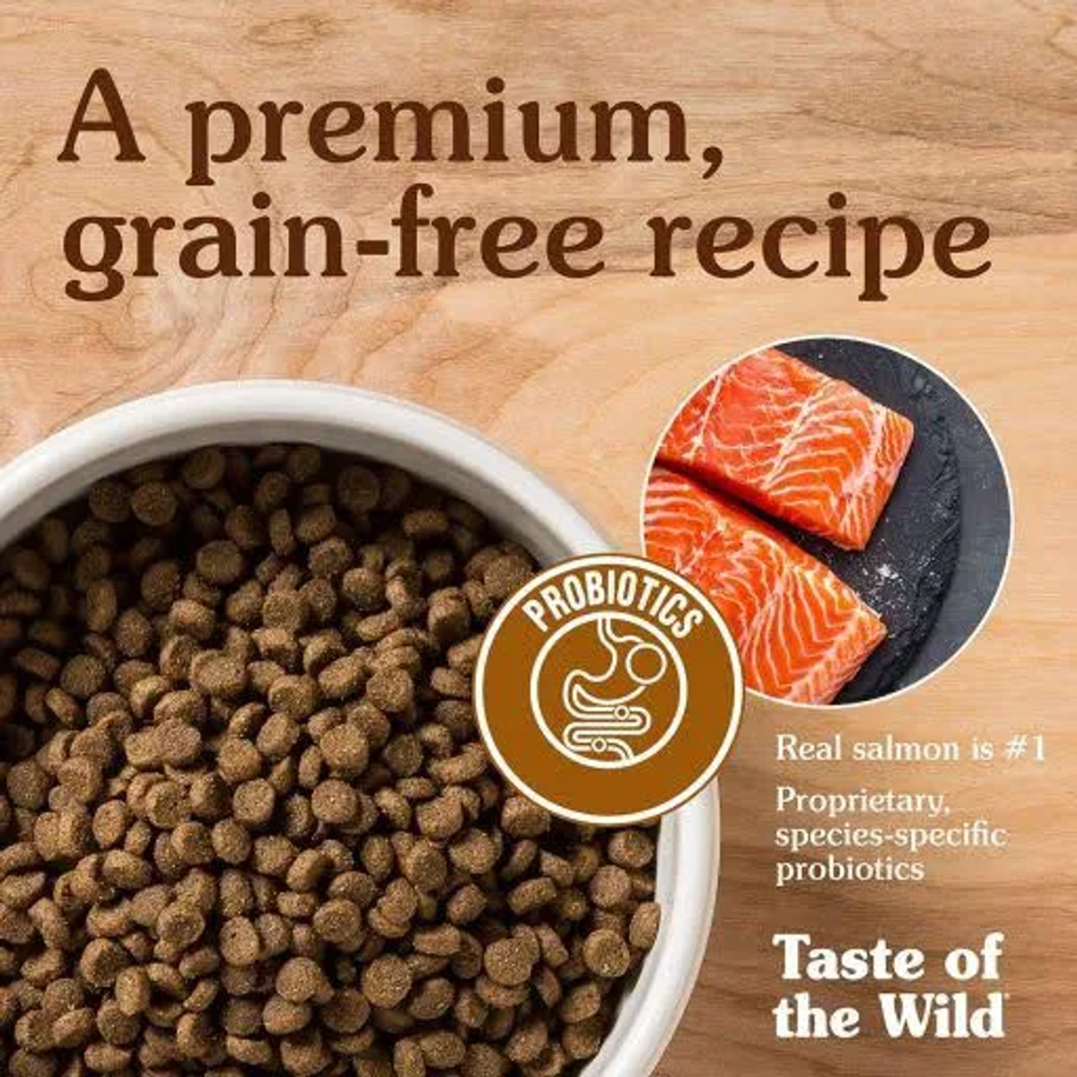 Miska karmy dla zwierząt z kawałkami łososia, logo probiotyków i tekstem: 'A premium, grain-free recipe' i 'Taste of the Wild'.