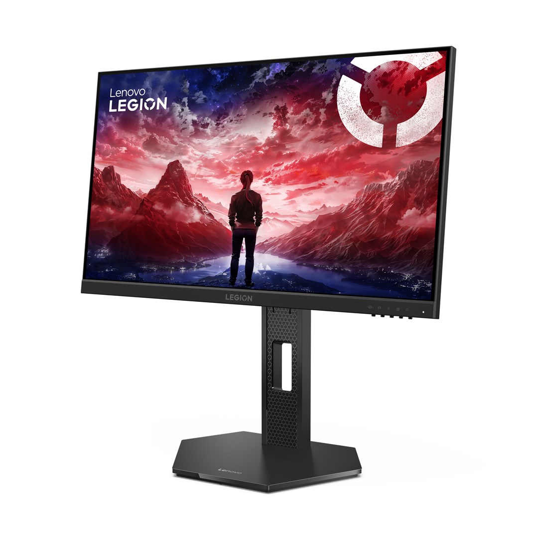 Monitor Lenovo Legion. Wyświetla osobę przed górami. Czerwone i niebieskie odcienie. Czarny stojak i podstawa na białym tle.
