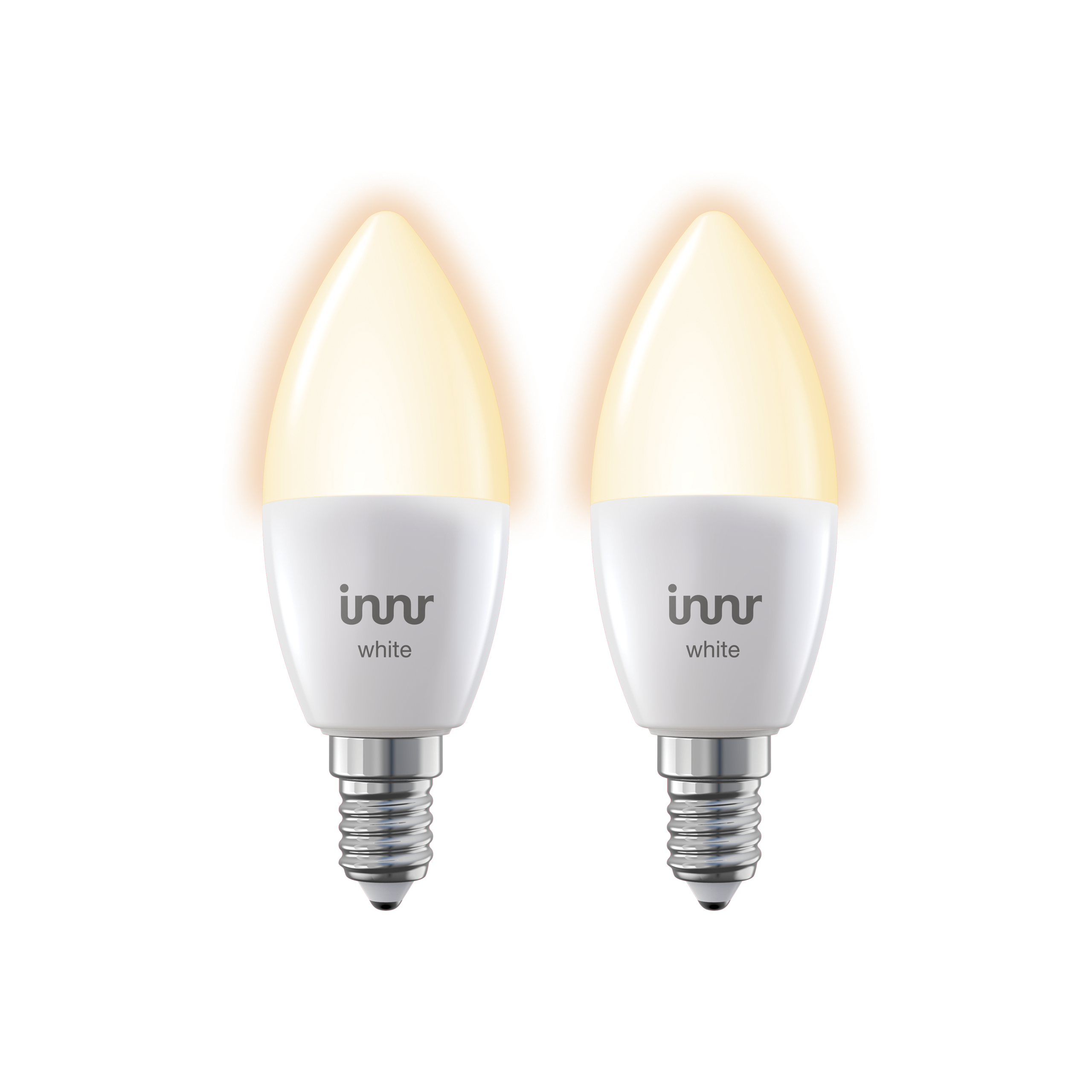 Deux ampoules intelligentes Innr blanches, brillantes, avec un fond noir.