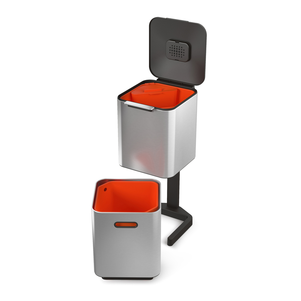 Un moderno cubo de basura plateado con tapa abierta, interior naranja y un cubo separado más pequeño. La tapa es negra.