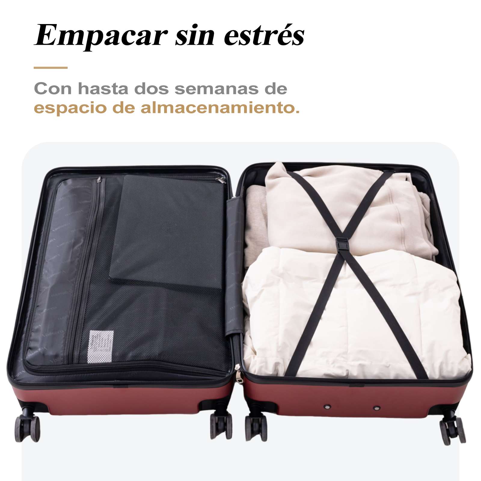 Maleta abierta con ropa dentro. Ropa beige y una manta blanca aseguradas con correas negras. Un bolsillo negro a la izquierda.