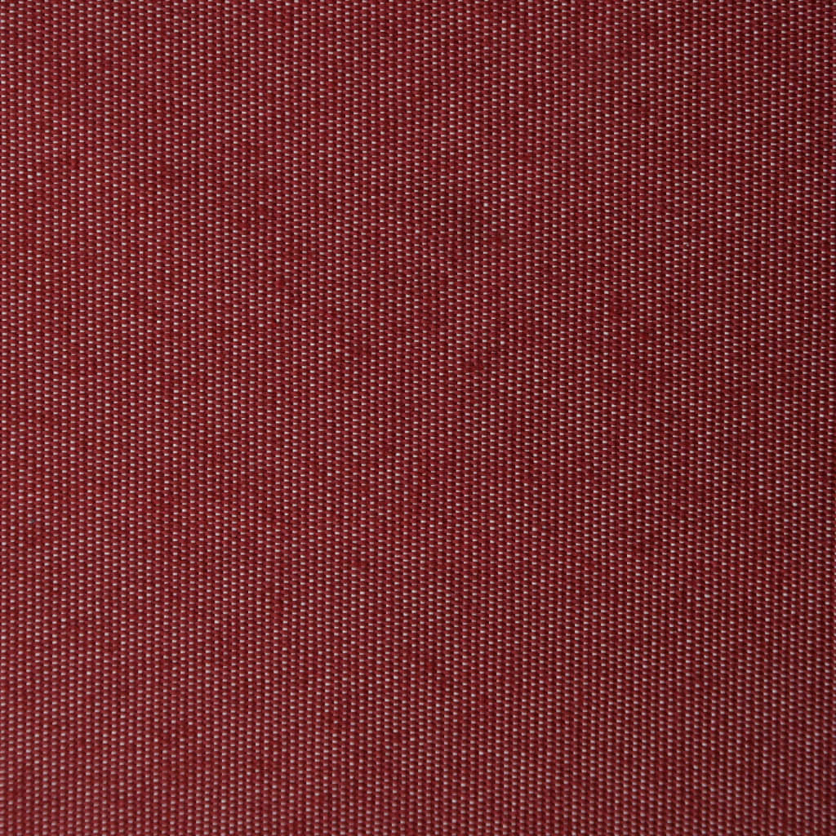 Nahaufnahme eines roten gewebten Stoffes. Die Textur zeigt ein Muster aus winzigen weißen Punkten im roten Material.
