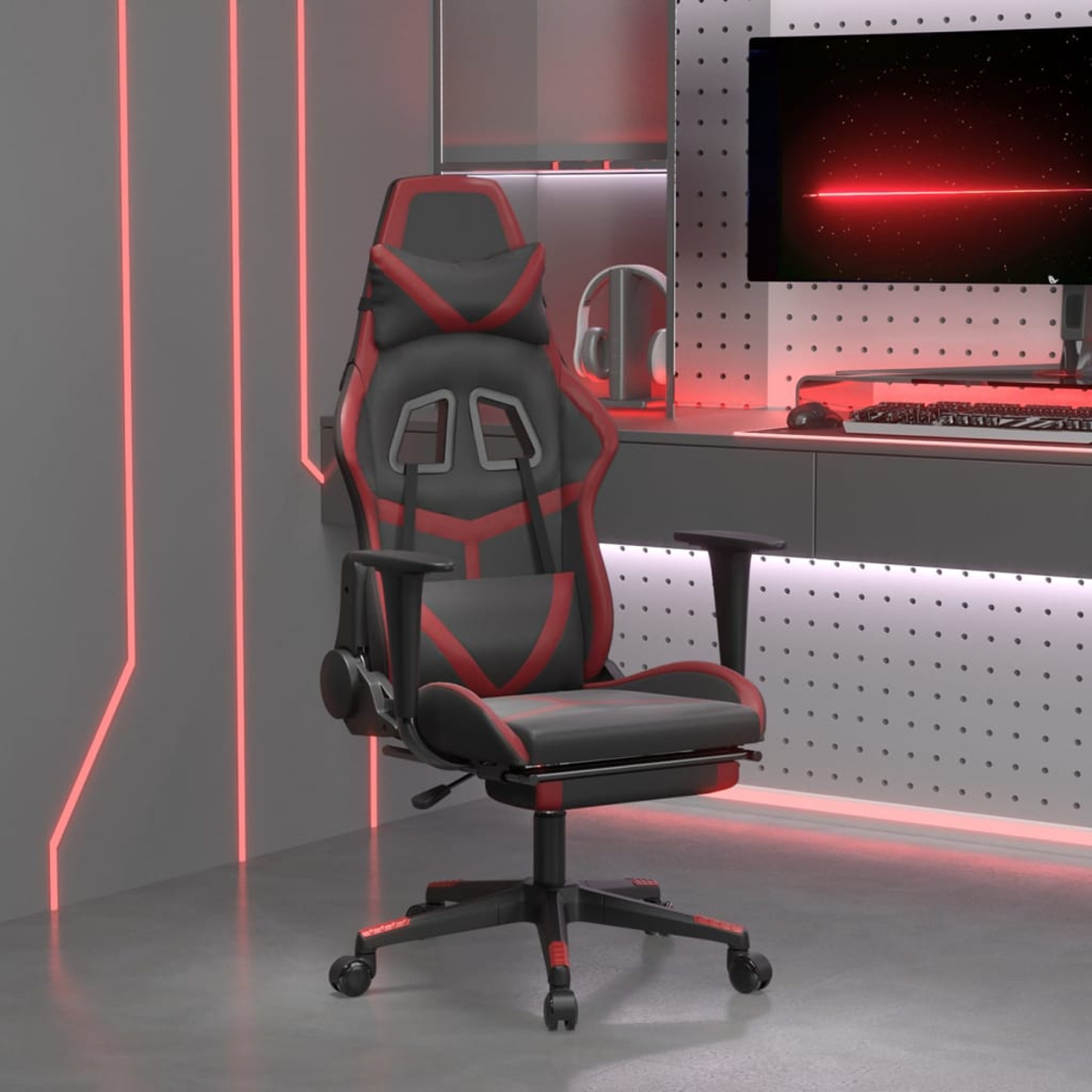 Ein Gaming-Stuhl mit rotem und schwarzem Design. Ein Computerbildschirm ist sichtbar, zusammen mit Kopfhörern, einer Tastatur und einer Maus.